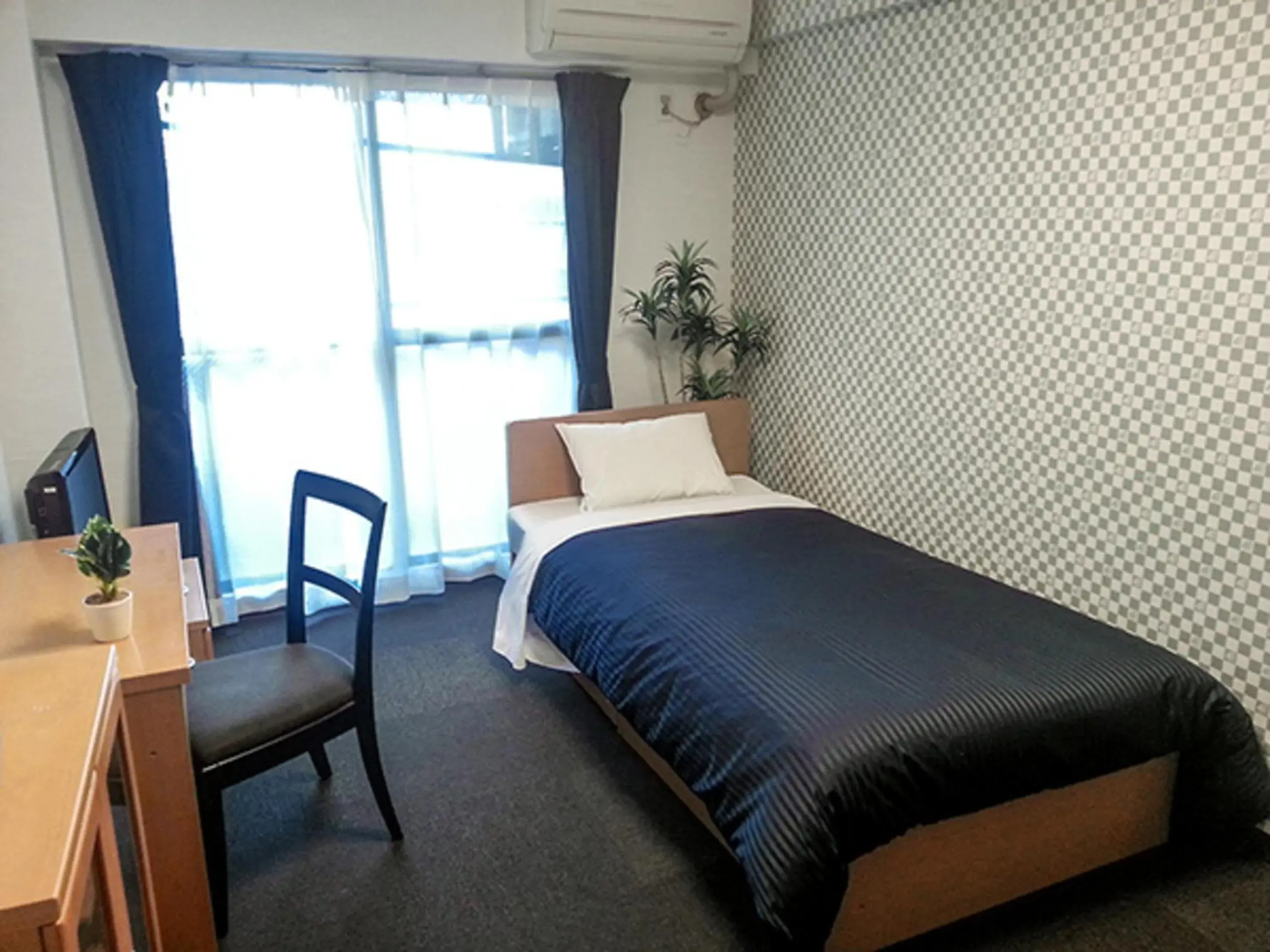 Photo of the whole room, Bed in HOTEL LiVEMAX BUDGET Fuchu