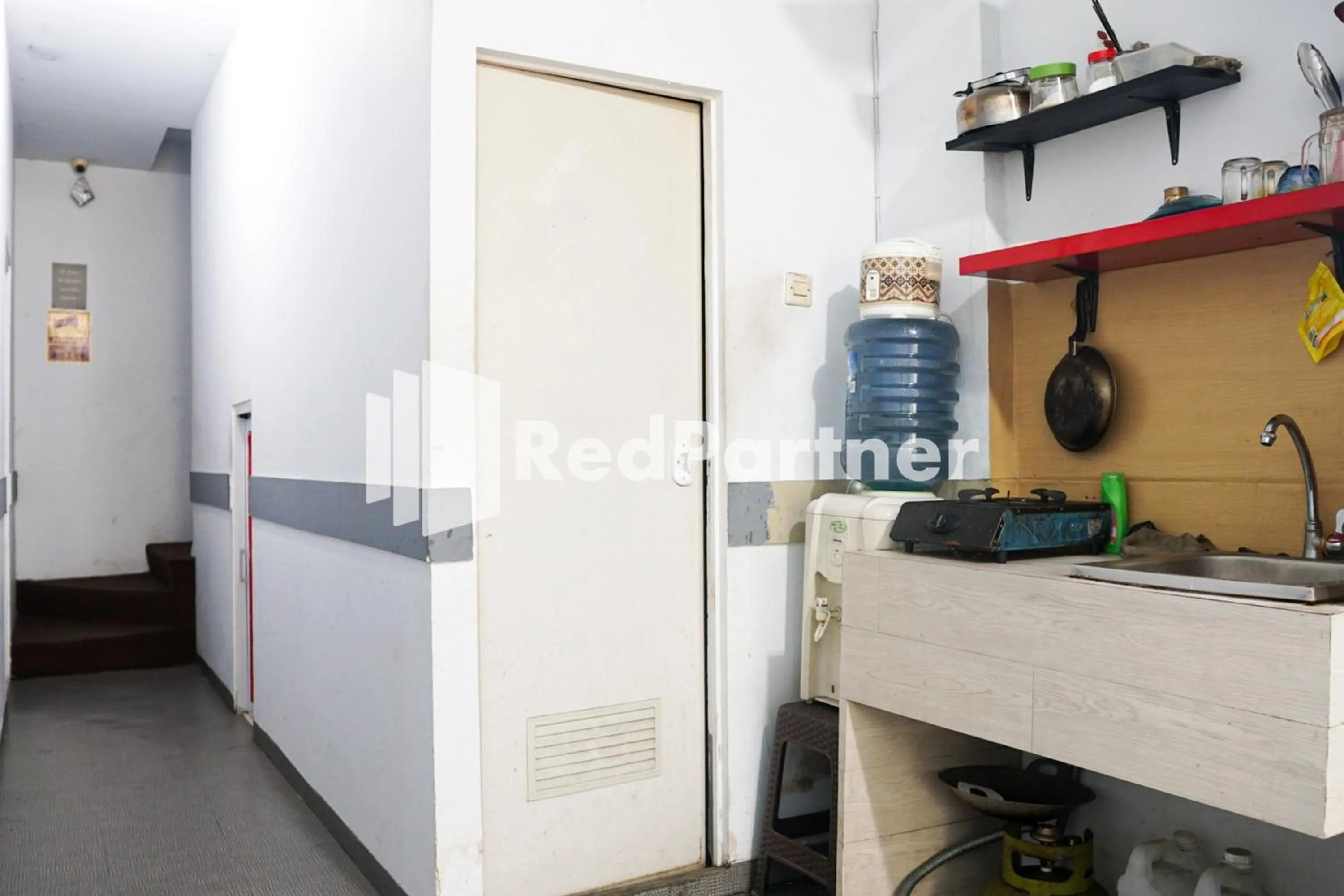 Kitchen or kitchenette in Cosmo Harmoni RedPartner