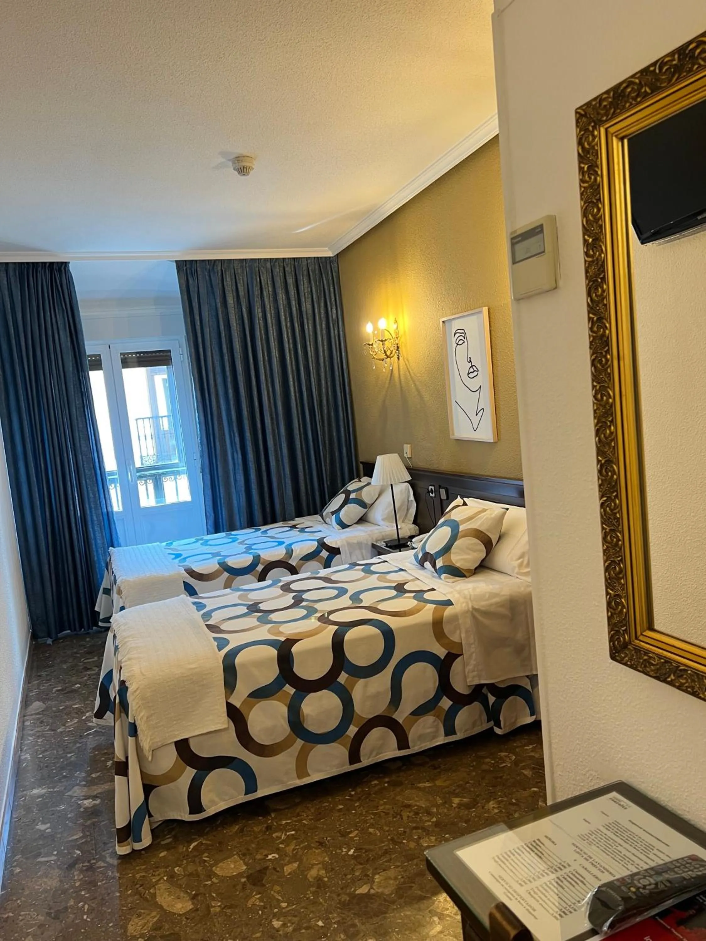 Photo of the whole room, Bed in Hostal Sonsoles Madrid-Centro