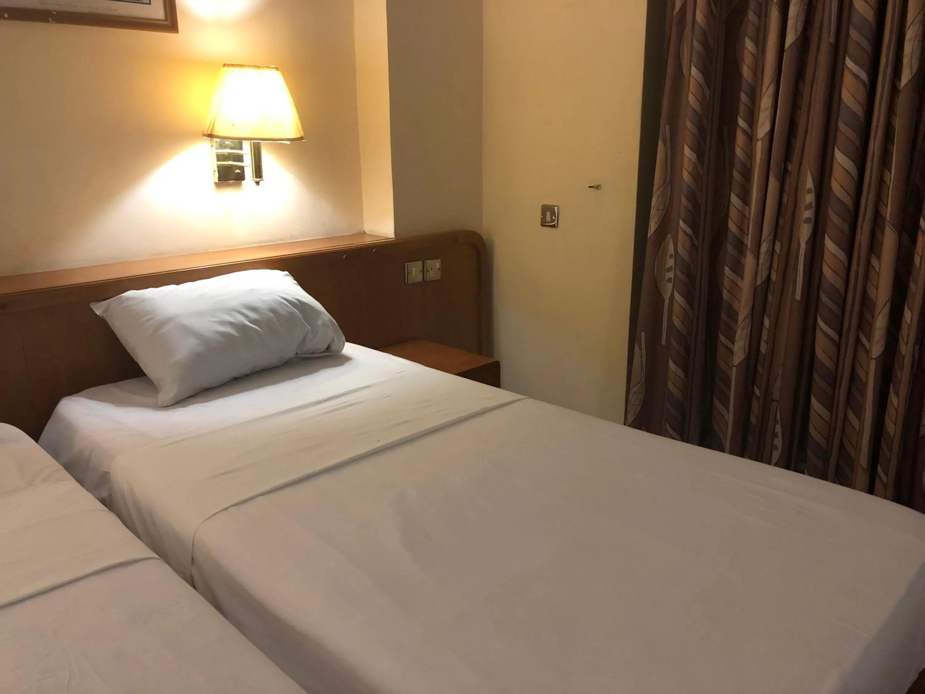 Bed in Maple Leaf Korean Hotel