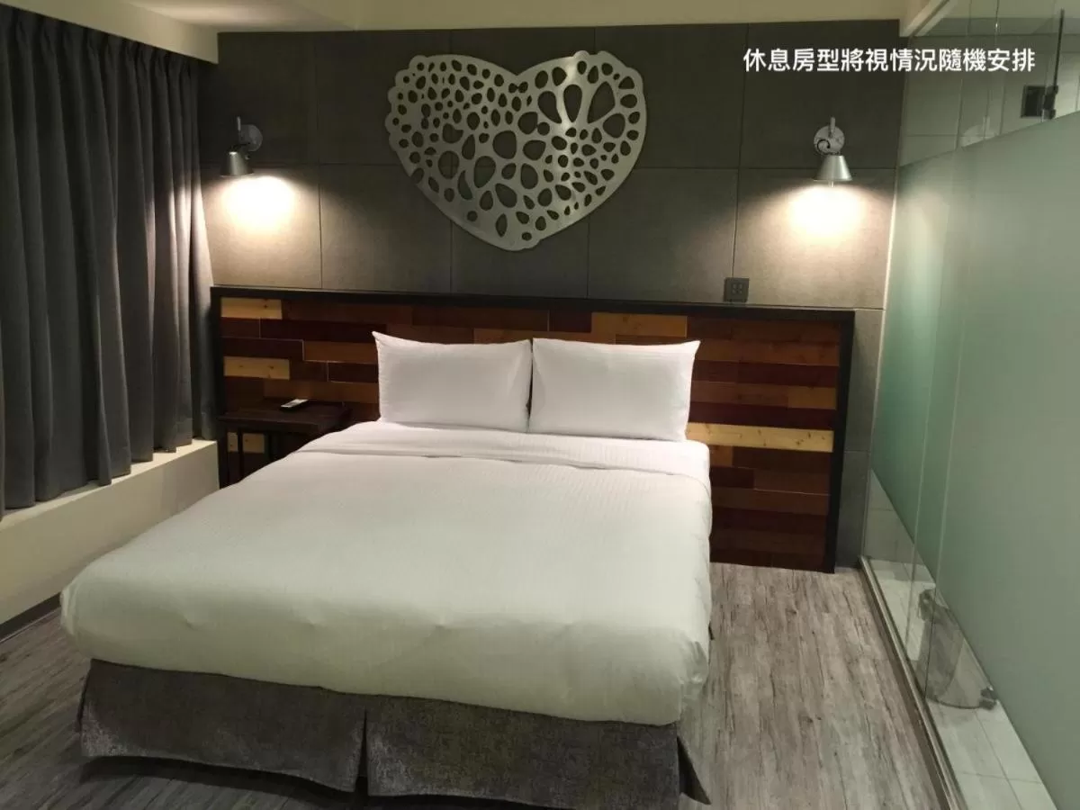 Bed in Xinshe Hotel - Hsinchu