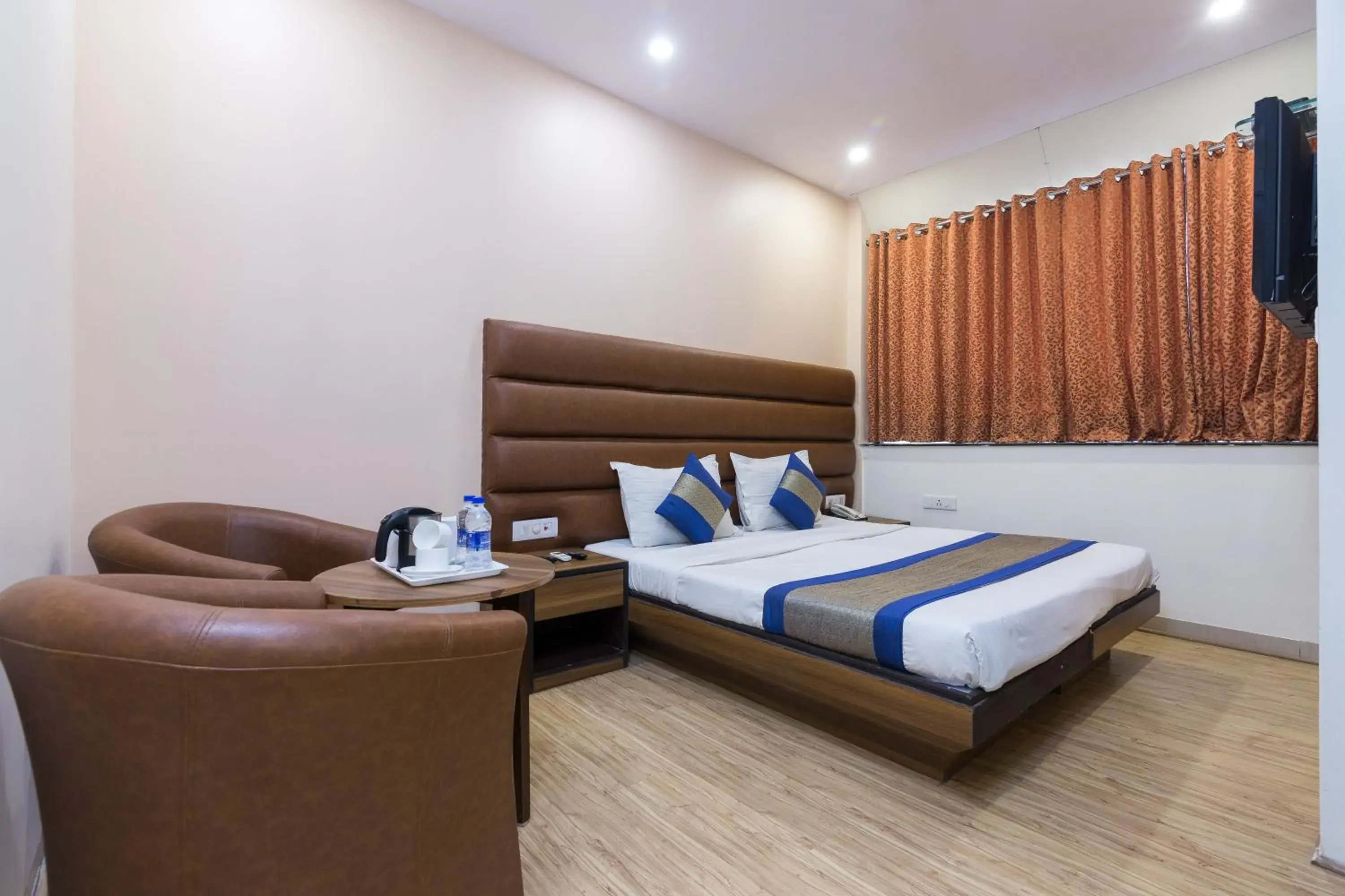 Photo of the whole room, Bed in Rupam Hotel