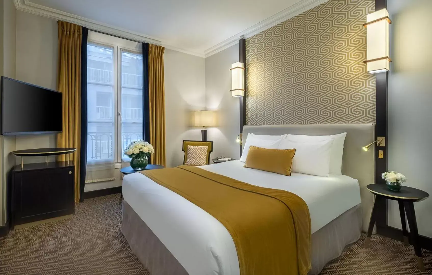 Bed in Hôtel Le Marquis by Inwood Hotels