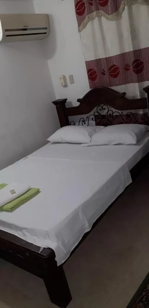 Bed in Hotel Mansión del Cesar
