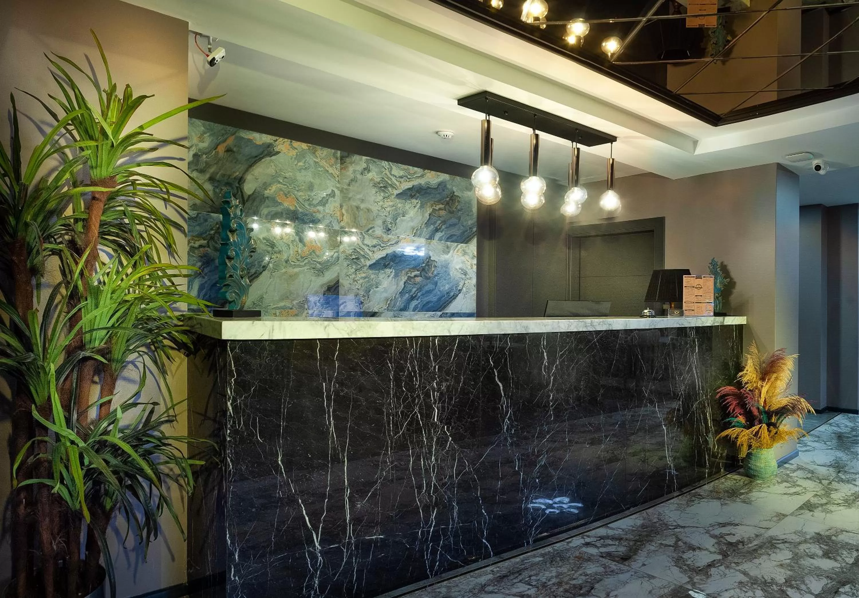 Lobby or reception in Hotel Bossuite Business