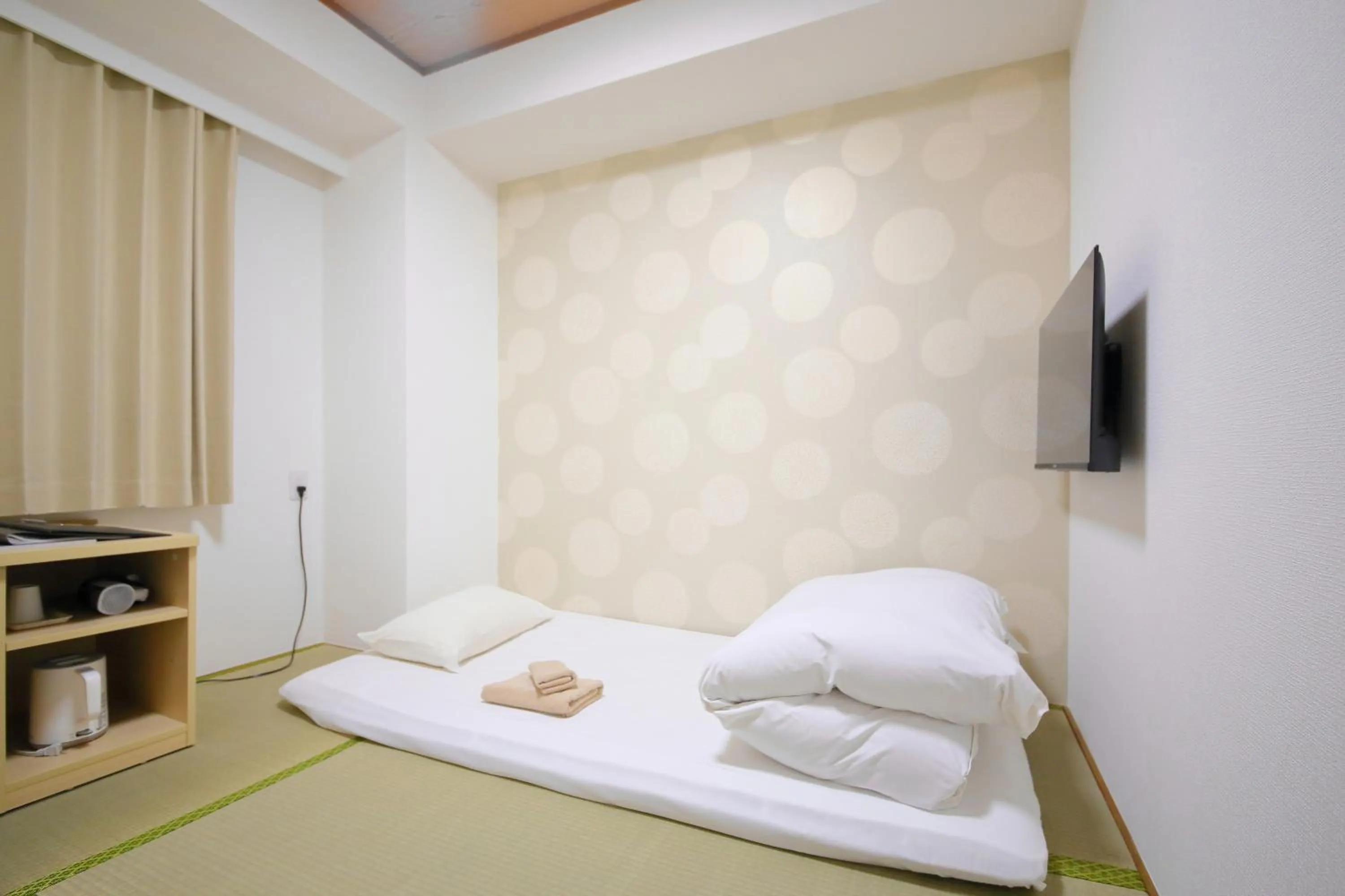 Bed in Hotel Shin-Imamiya