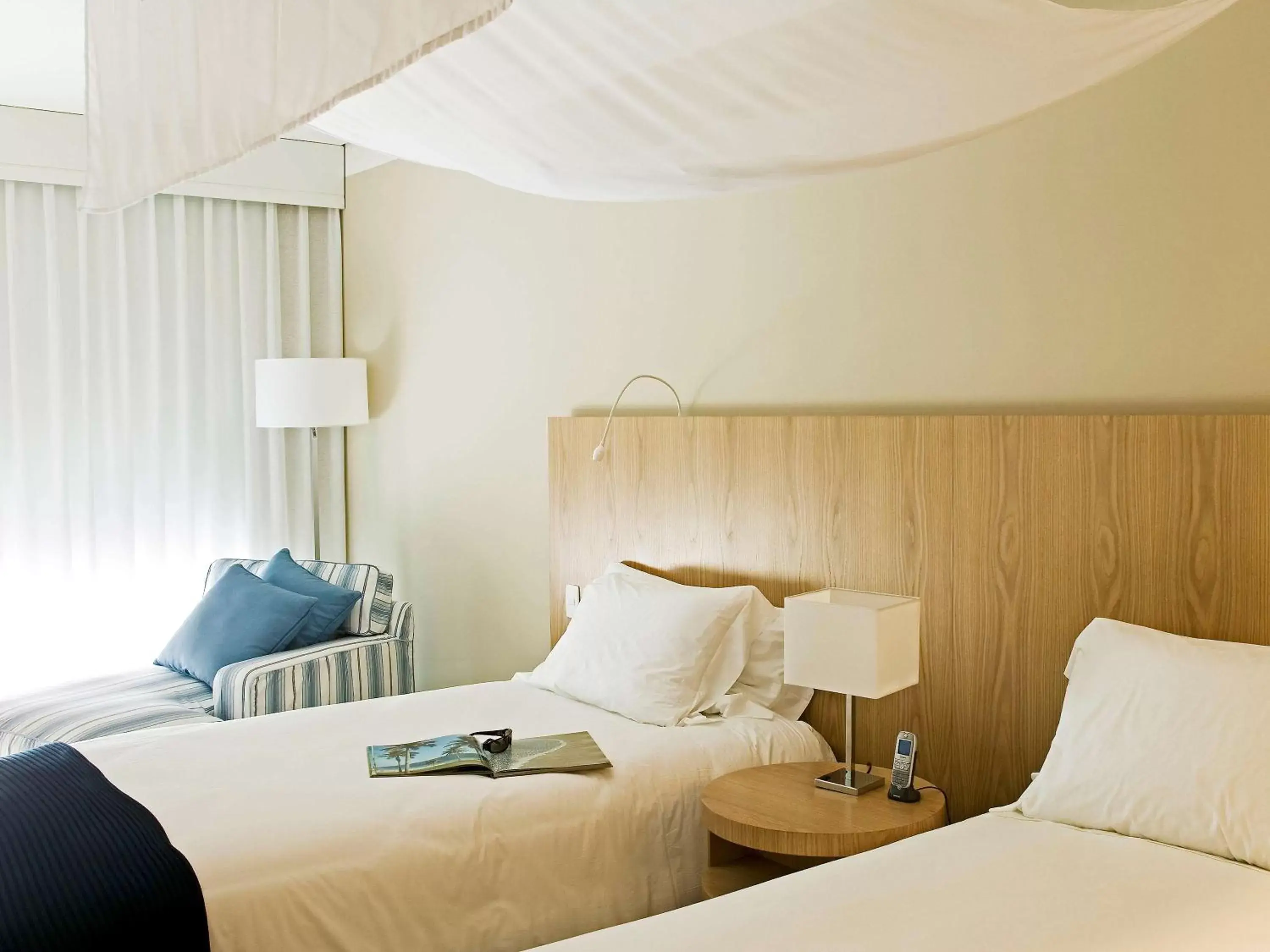 Photo of the whole room, Bed in Hotel Jequitimar Guaruja Resort & Spa by Accor - Ex Sofitel