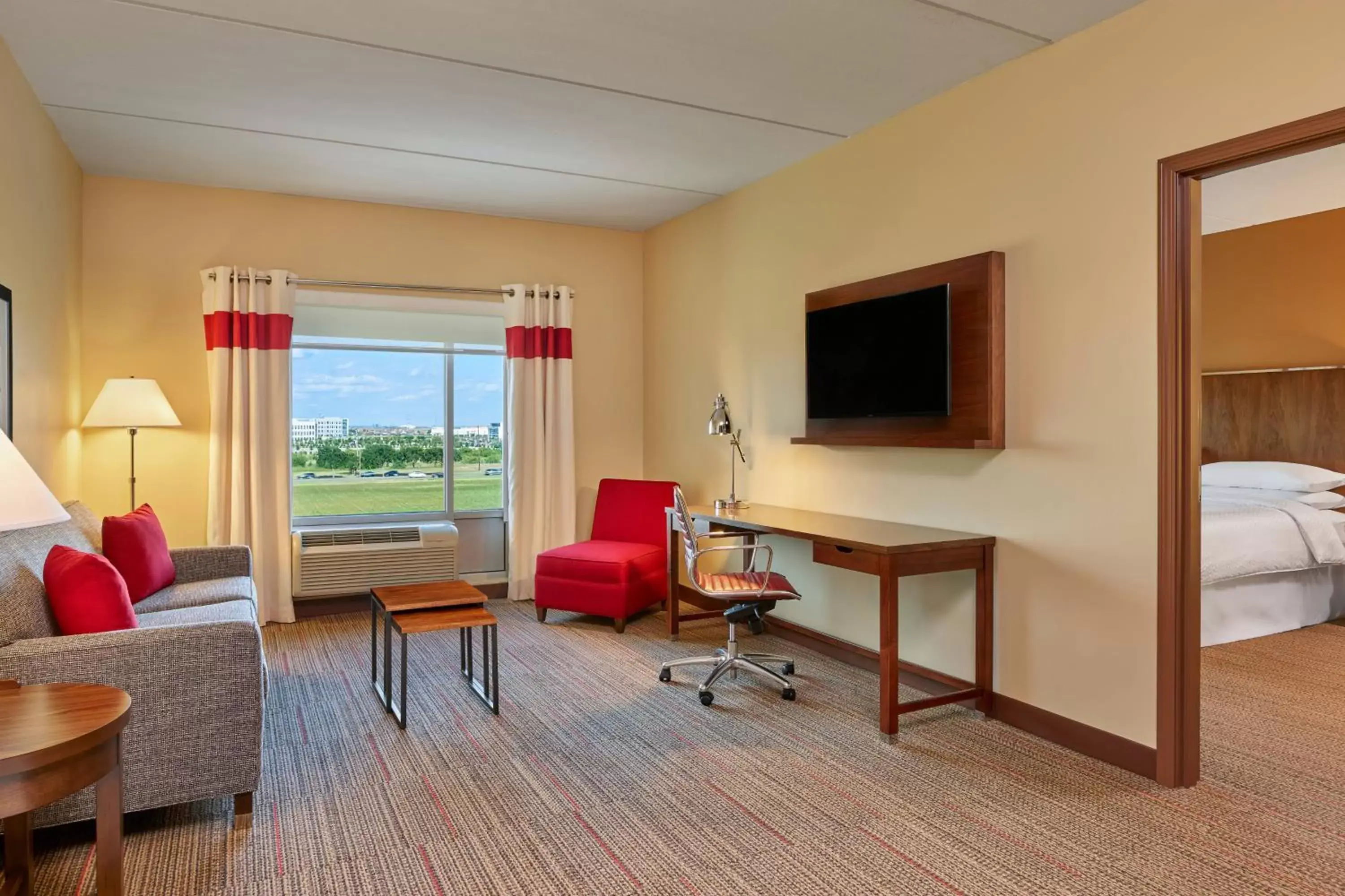 Bedroom, Seating Area in Four Points by Sheraton Dallas Fort Worth Airport North