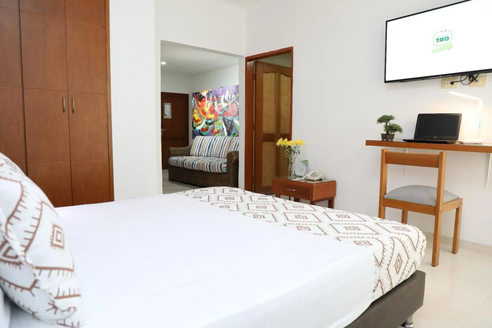 Living room, Bed in Hotel Guane