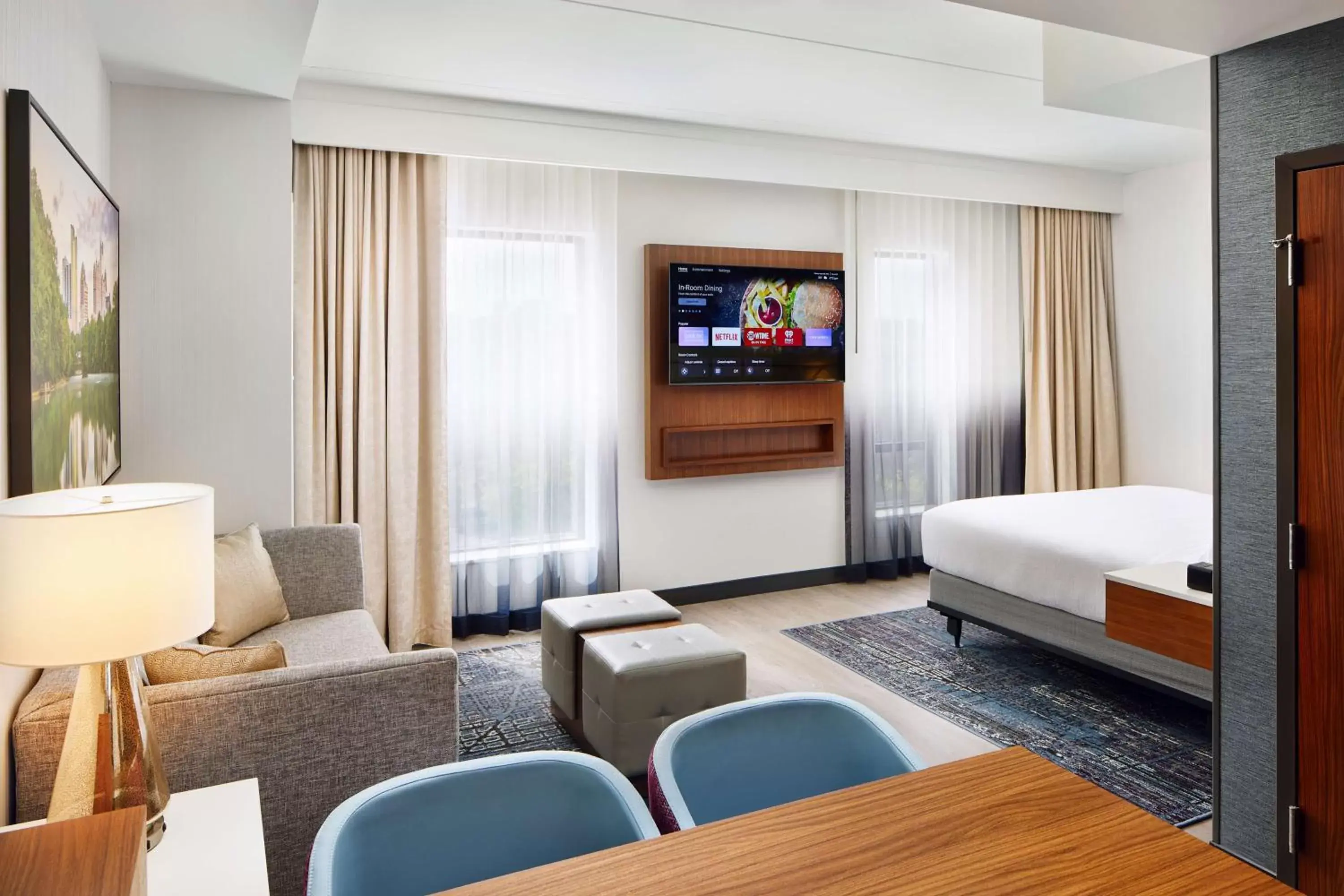 Living room, TV/Entertainment Center in Embassy Suites By Hilton Atlanta Airport North