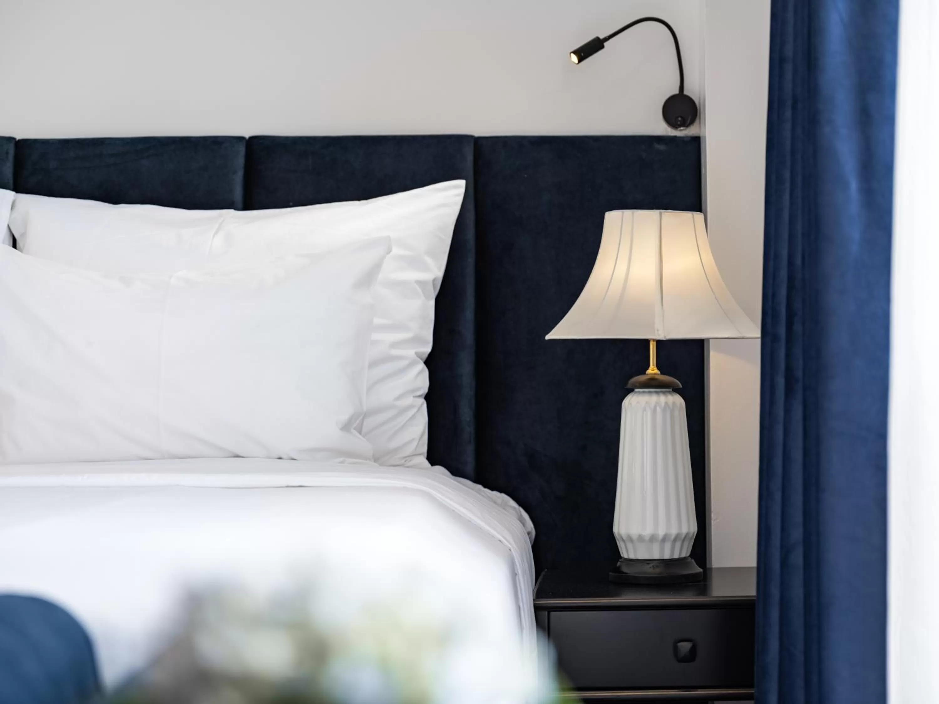 Bed in The Flower Boutique Hotel & Travel