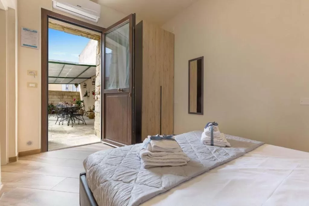 Photo of the whole room, Bed in Salento Ada's House