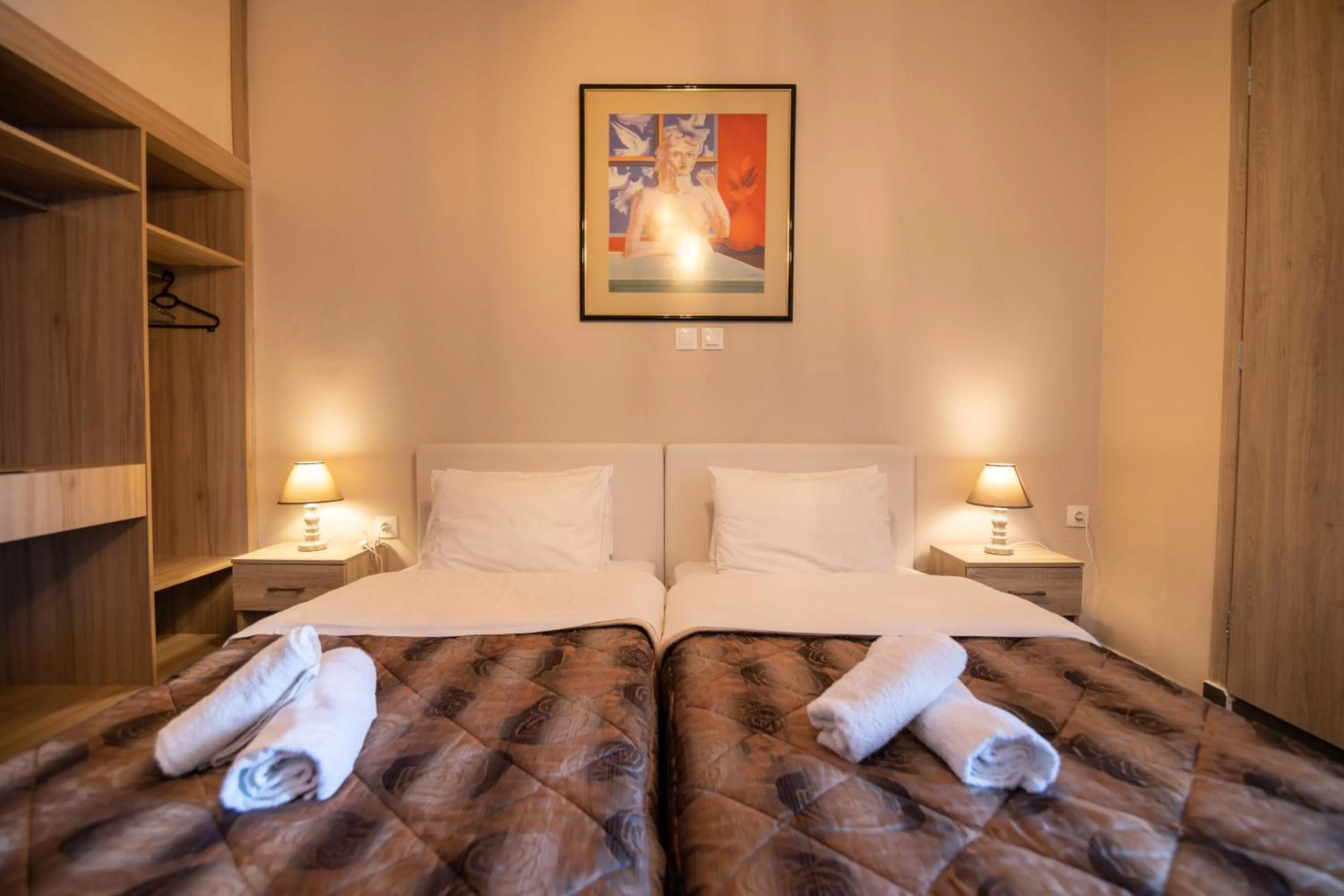 Bed in Votsalakia Hotel & Luxury Apartments