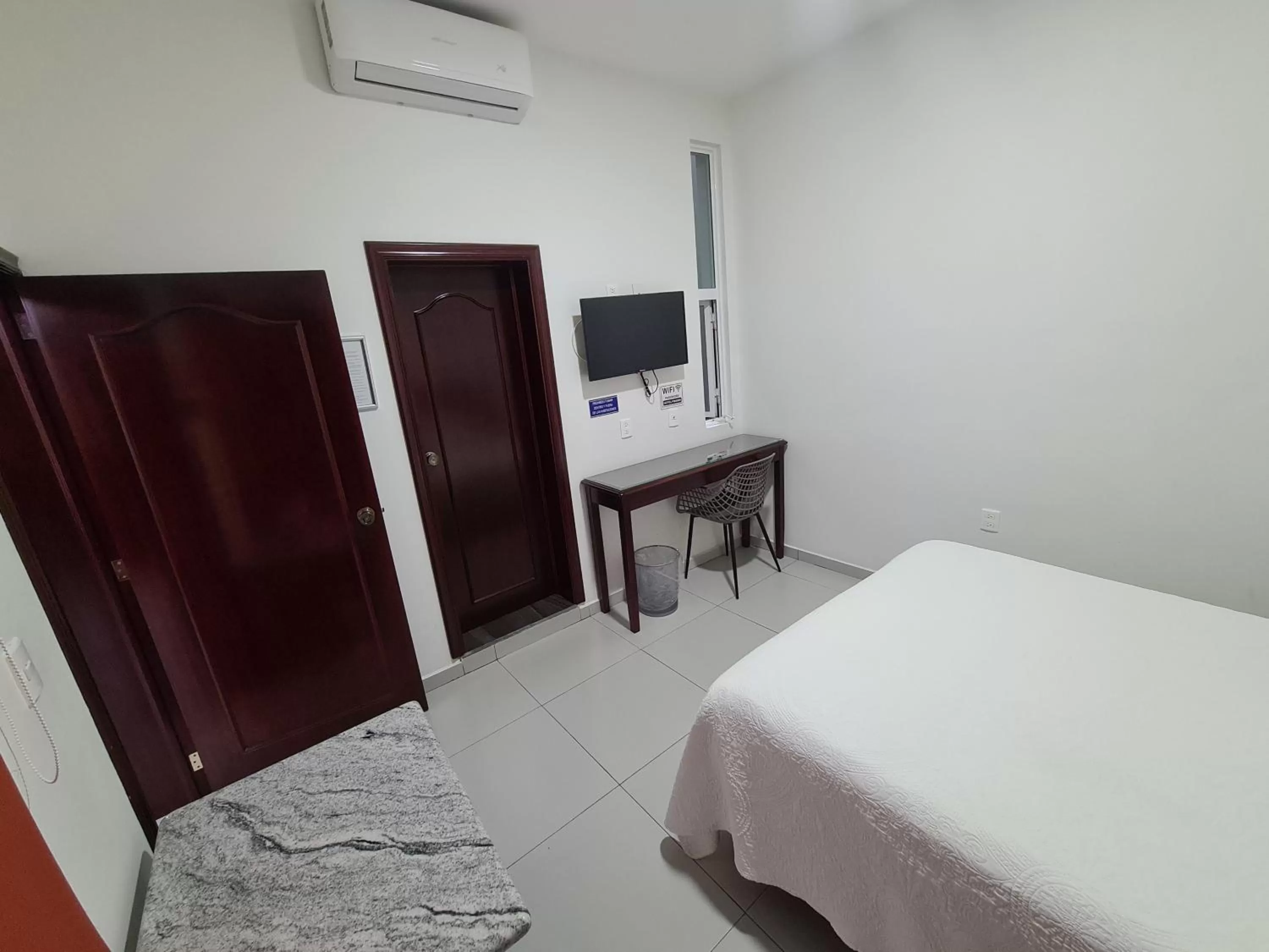 Bed in HOTEL FINA INN