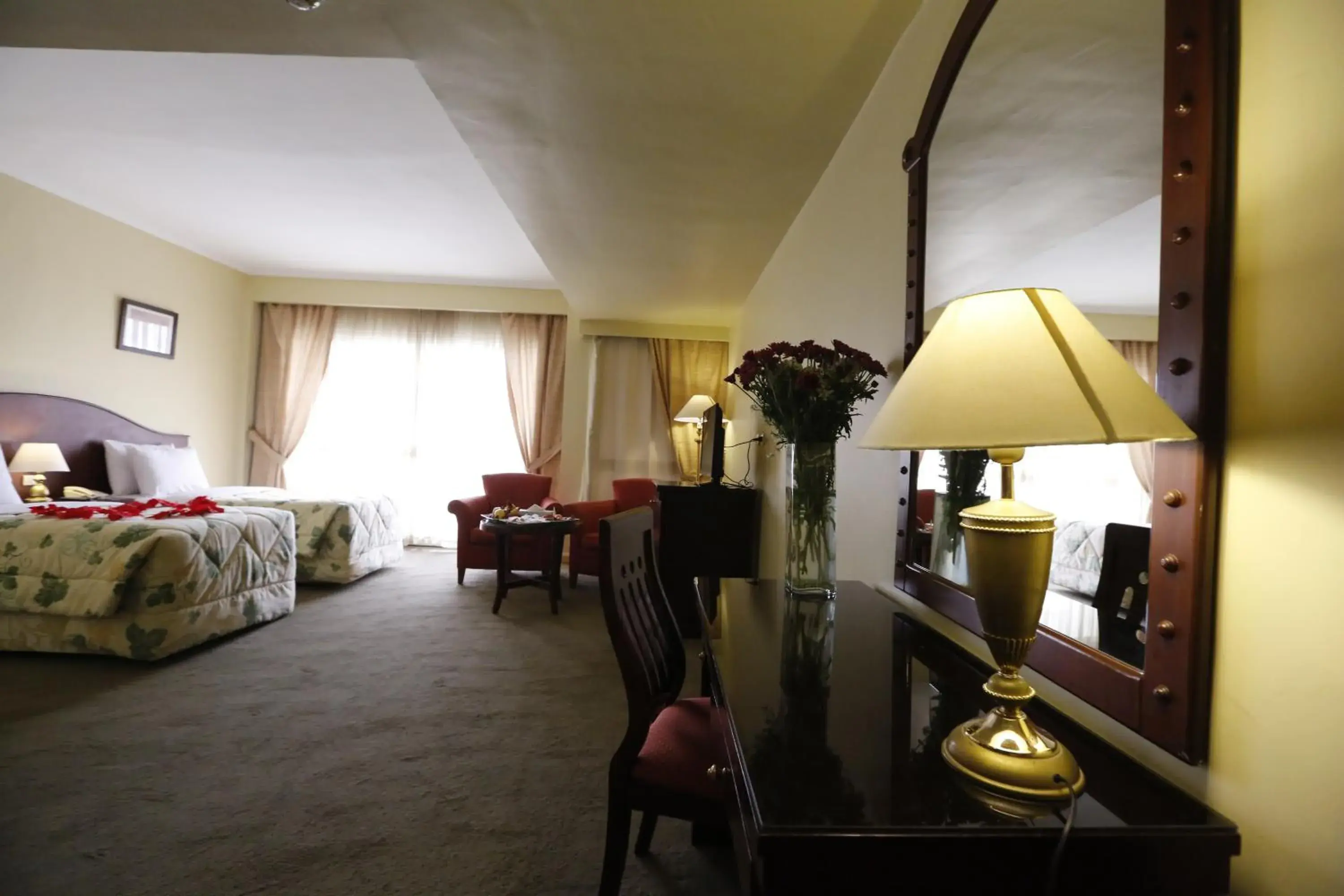 Bed, Seating Area in Horizon Shahrazad Hotel