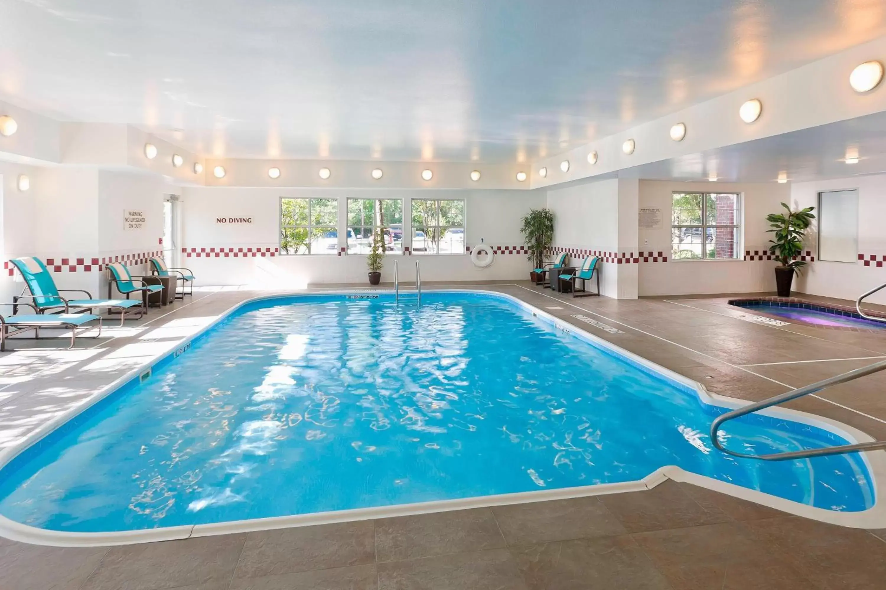 Swimming Pool in Residence Inn by Marriott Houston The Woodlands/Lake Front Circle