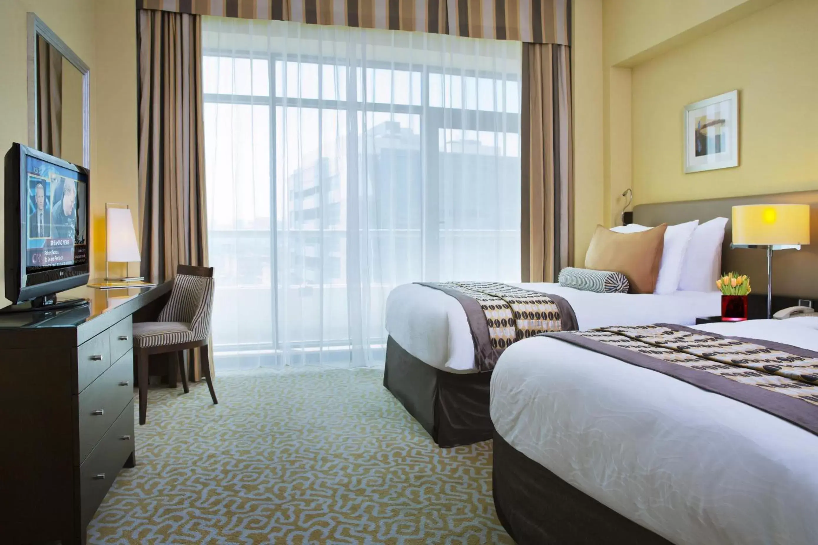Bed in TIME Oak Hotel & Suites