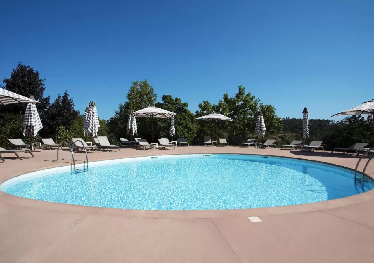 Swimming pool in Montebelo Principe Perfeito Viseu Garden Hotel