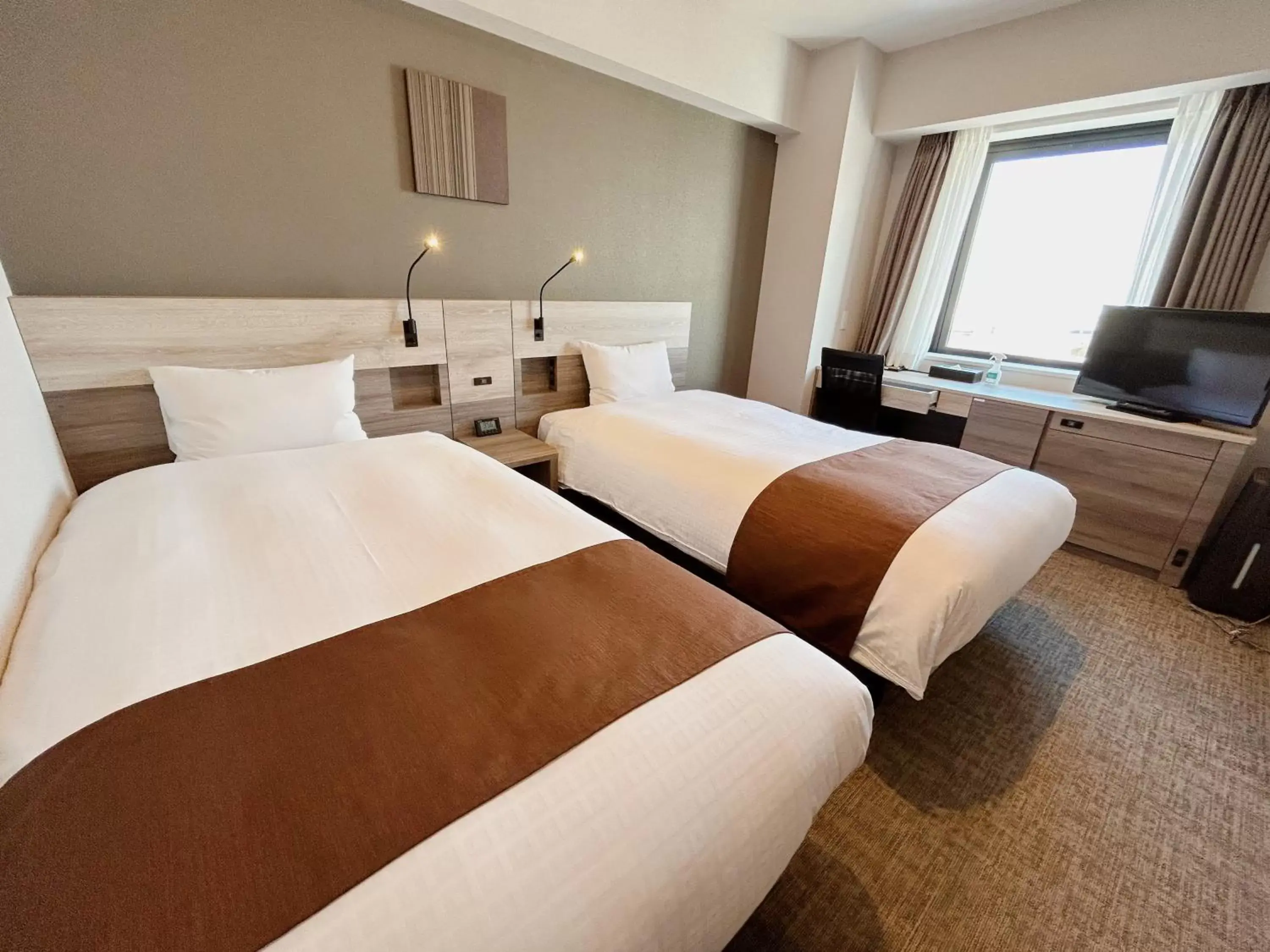 Photo of the whole room, Bed in Smile Hotel Premium Hakodate Goryokaku