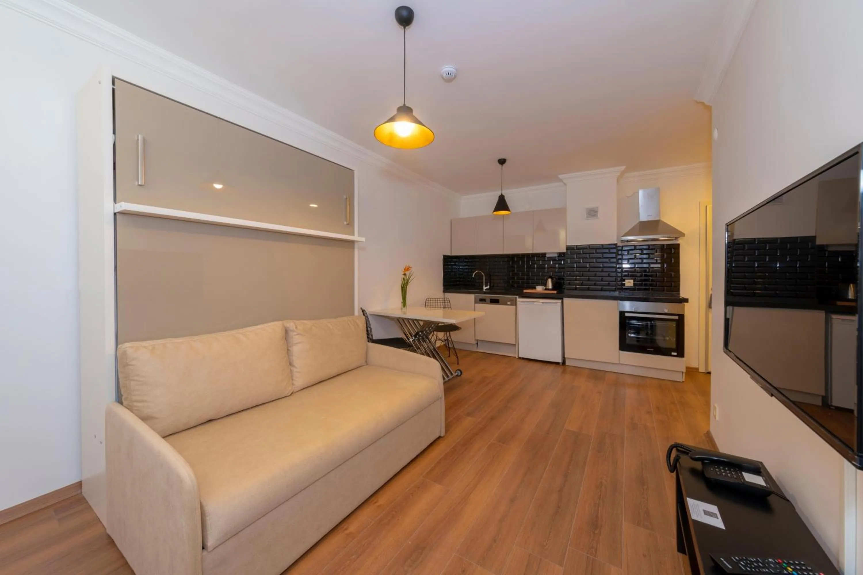 Kitchen or kitchenette in Joy Suites