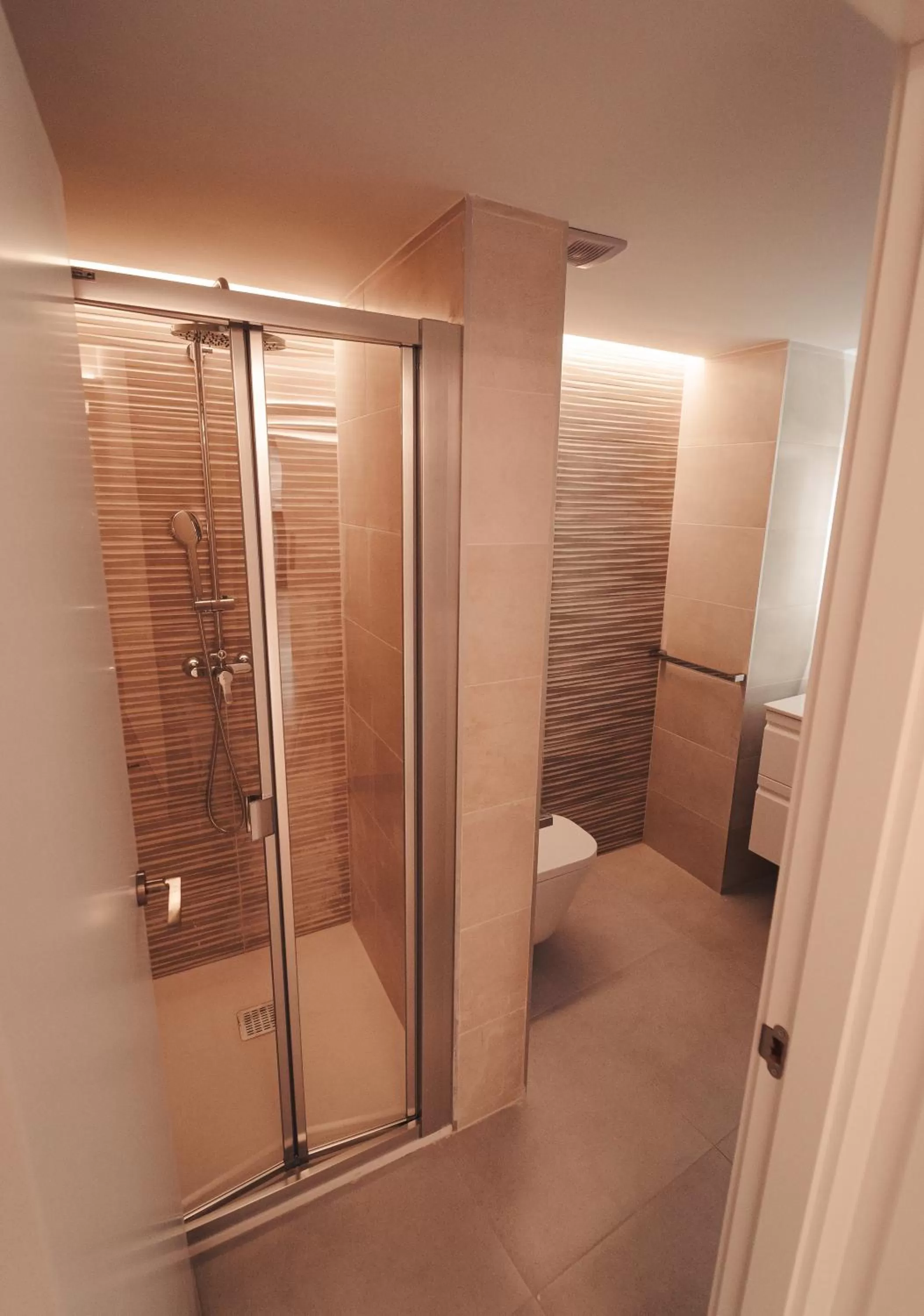 Bathroom in Palm Suites