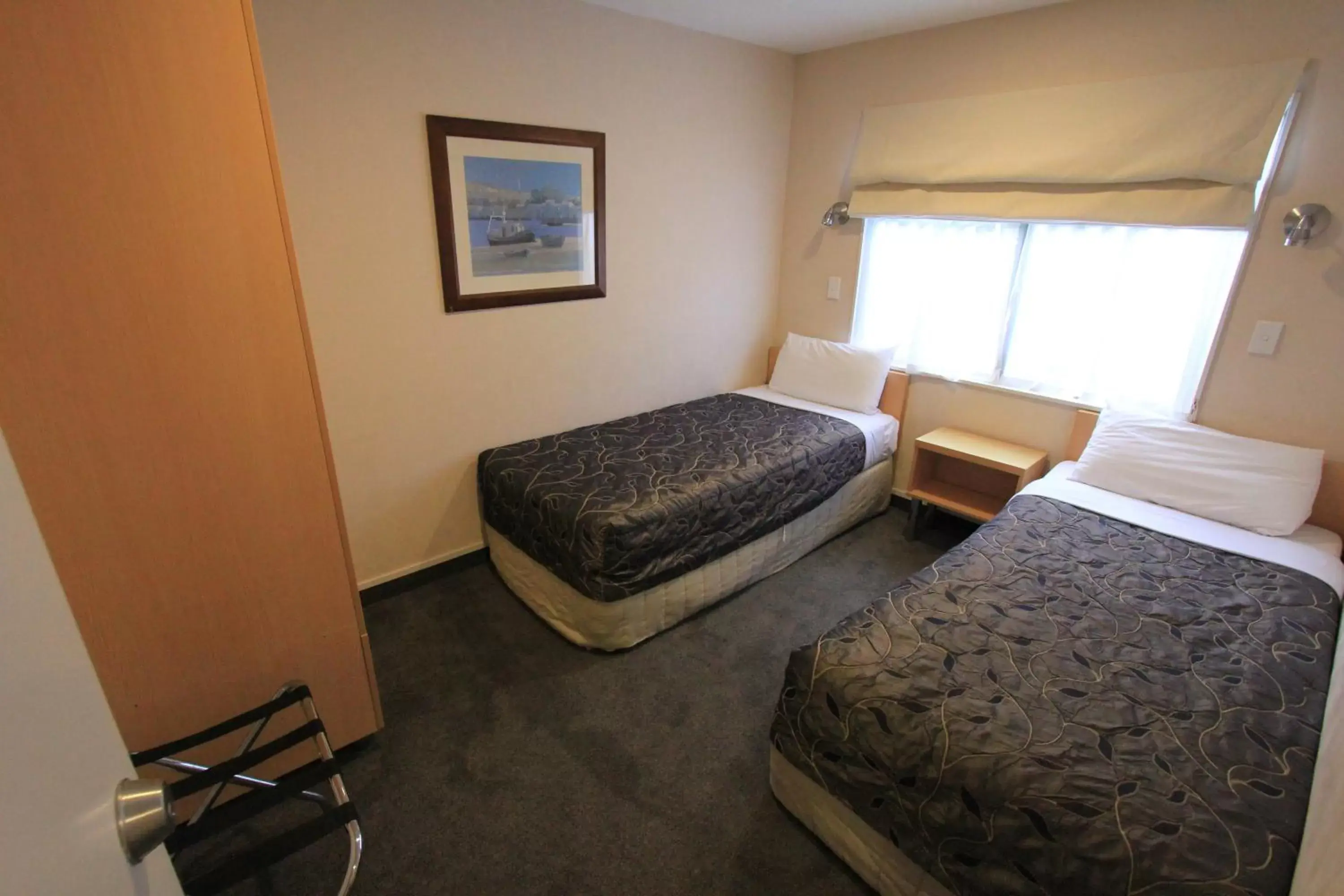 Bedroom, Bed in Voyager Apartments Taupo