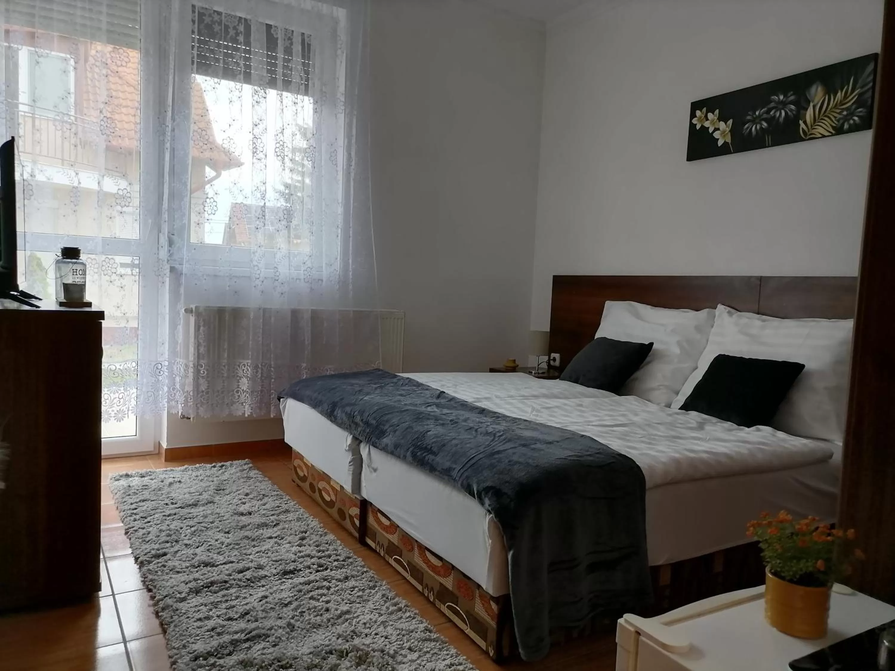 Bed in Aqua Oazis Apartman