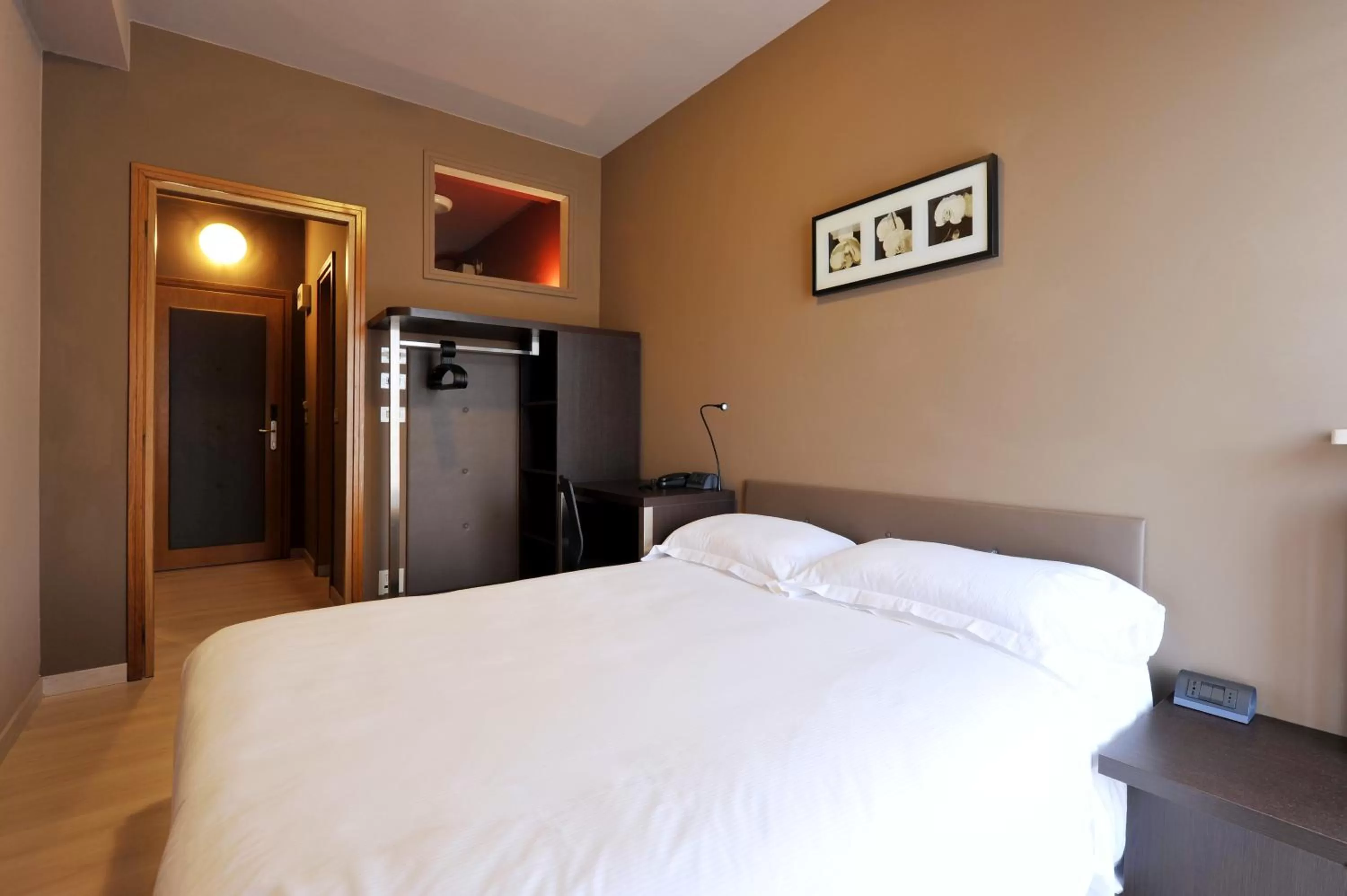 Bed in M14 Hotel & Spa