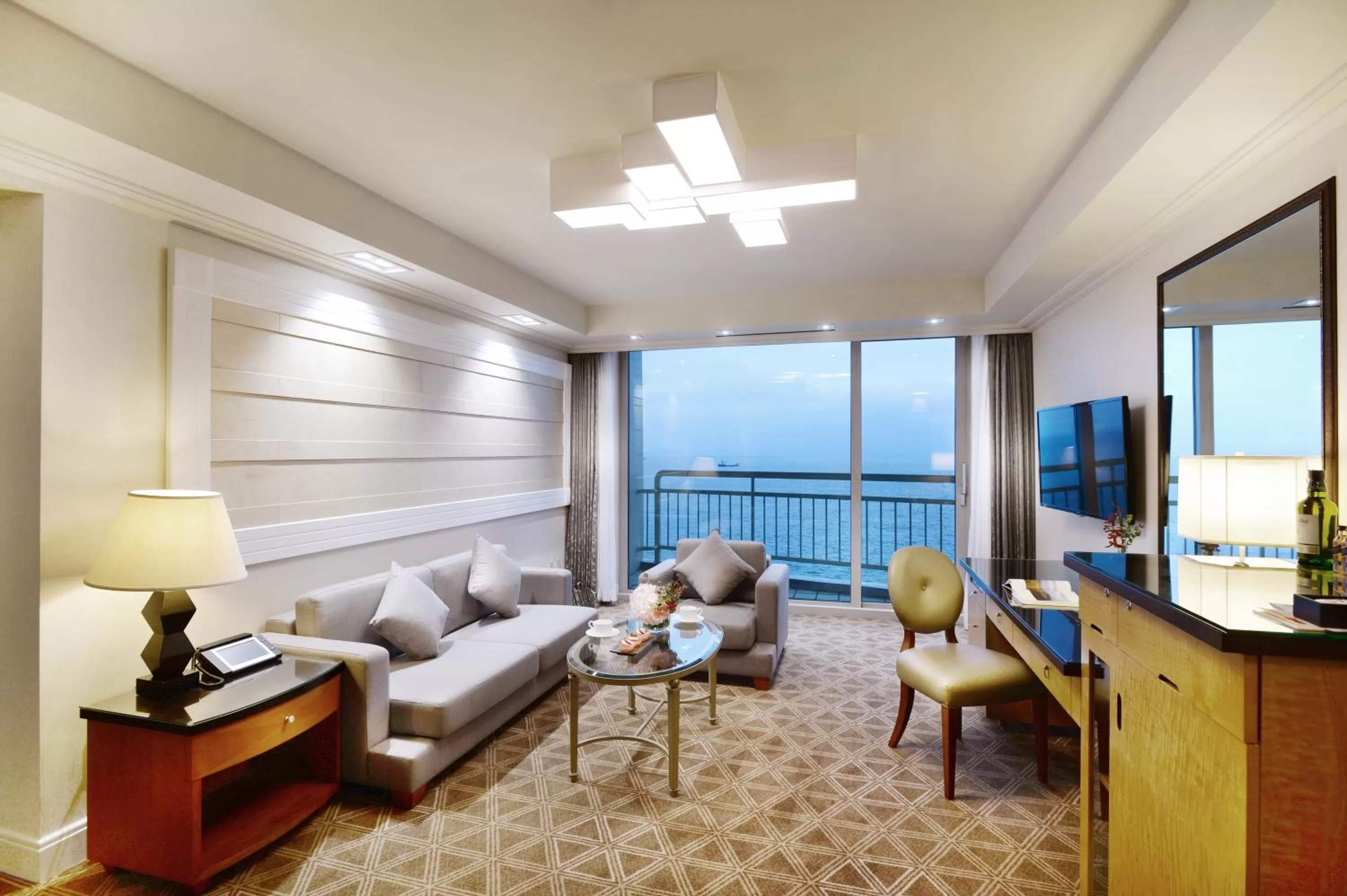 Living room in Ramada Plaza by Wyndham Jeju Ocean Front