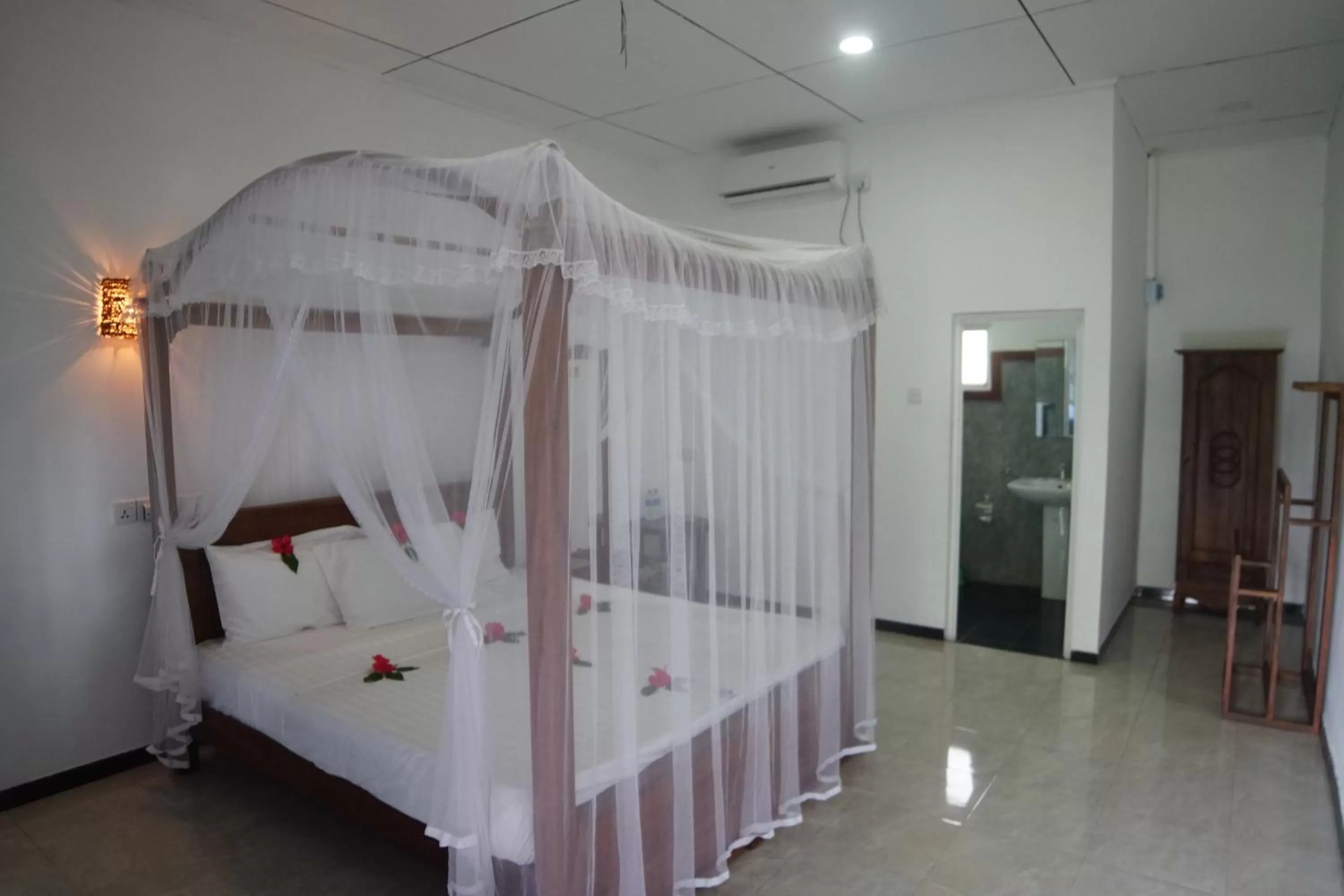 Bed in Turtle Bay Beach Resort