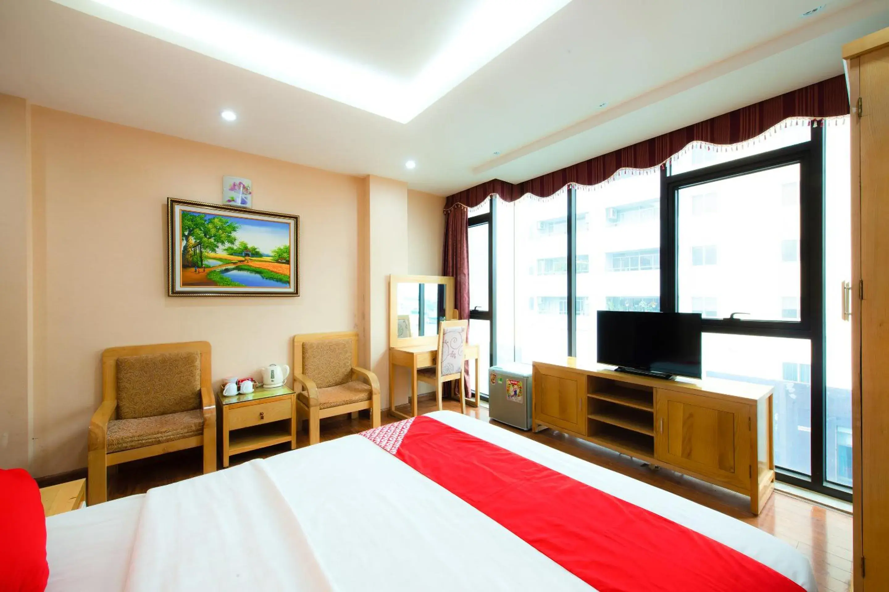 Bedroom, TV/Entertainment Center in OYO 191 Dragon Hotel