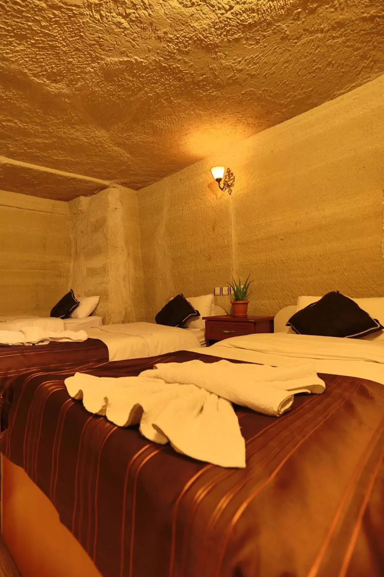 Bed in Guven Cave Hotel