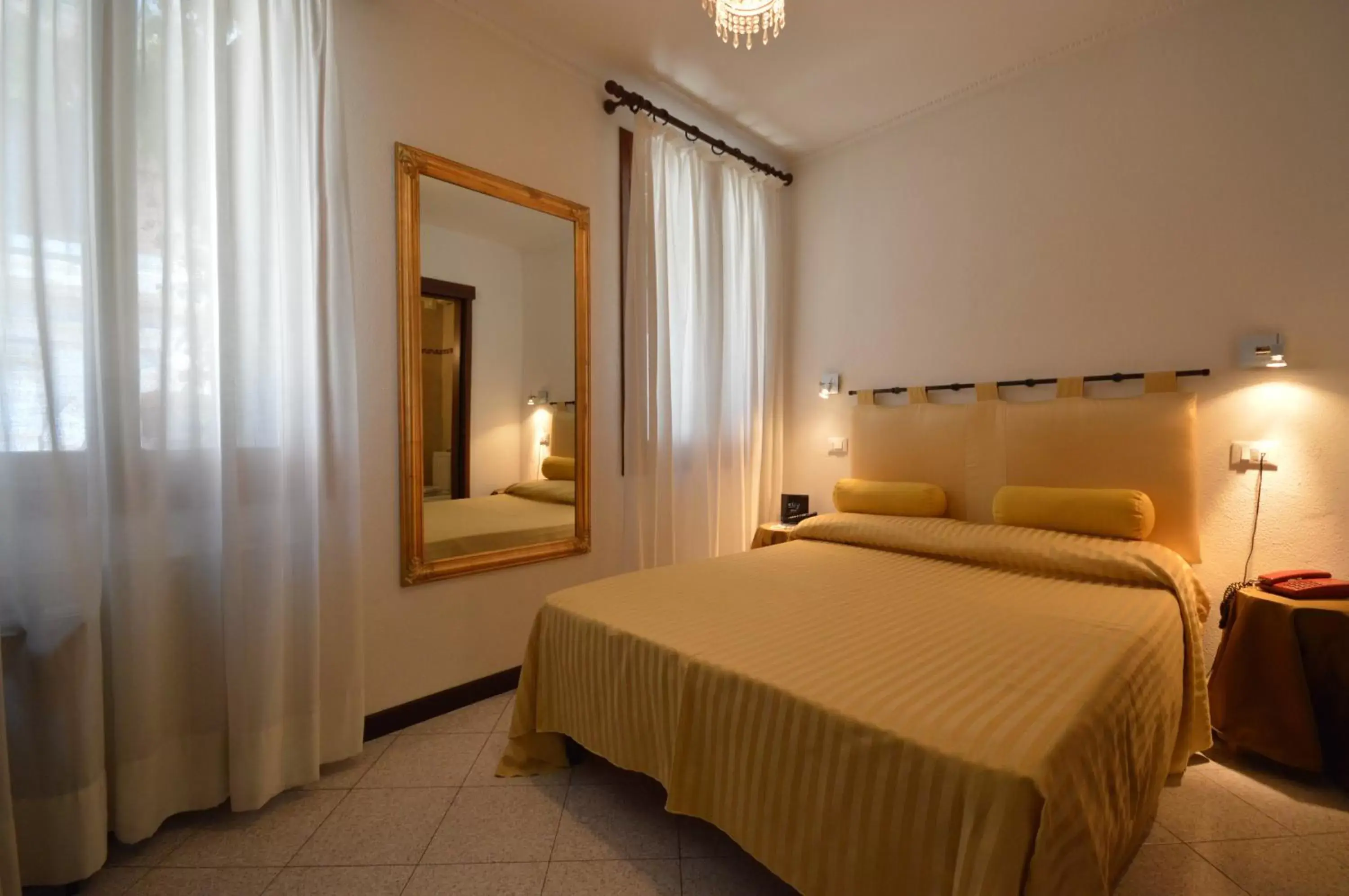 Photo of the whole room, Bed in Albergo Marin