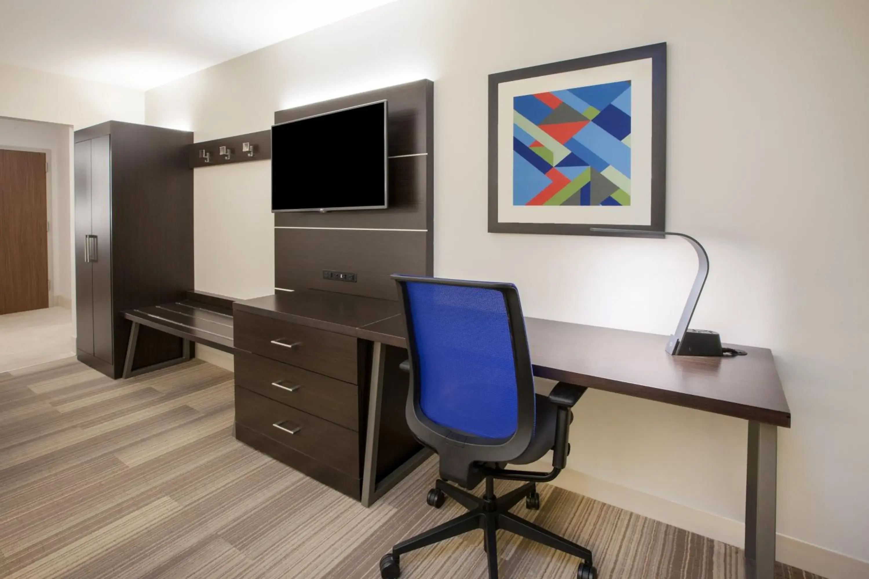 Photo of the whole room, TV/Entertainment Center in Holiday Inn Express Austin North Central, an IHG Hotel
