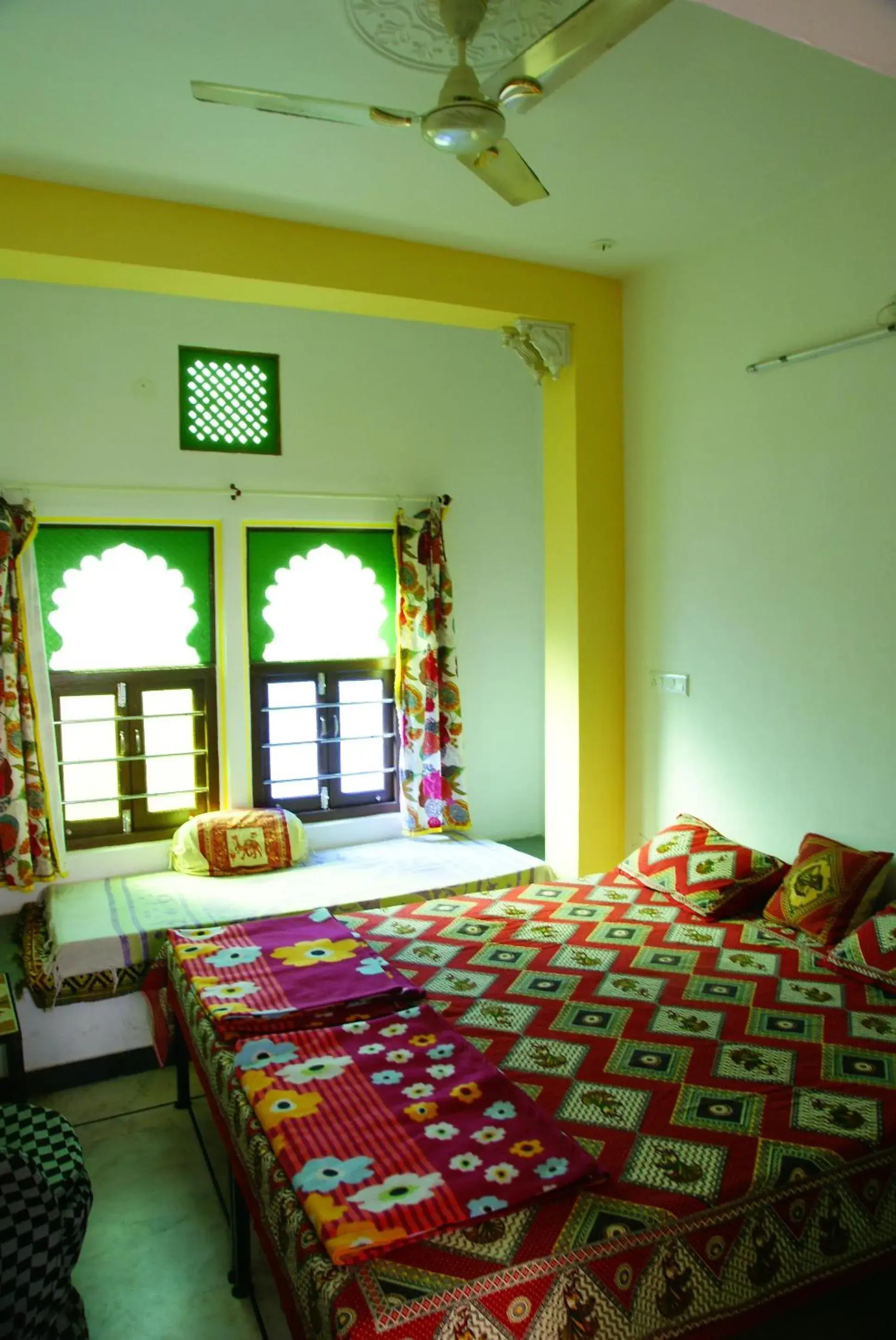 Bed in Udai Haveli Guesthouse