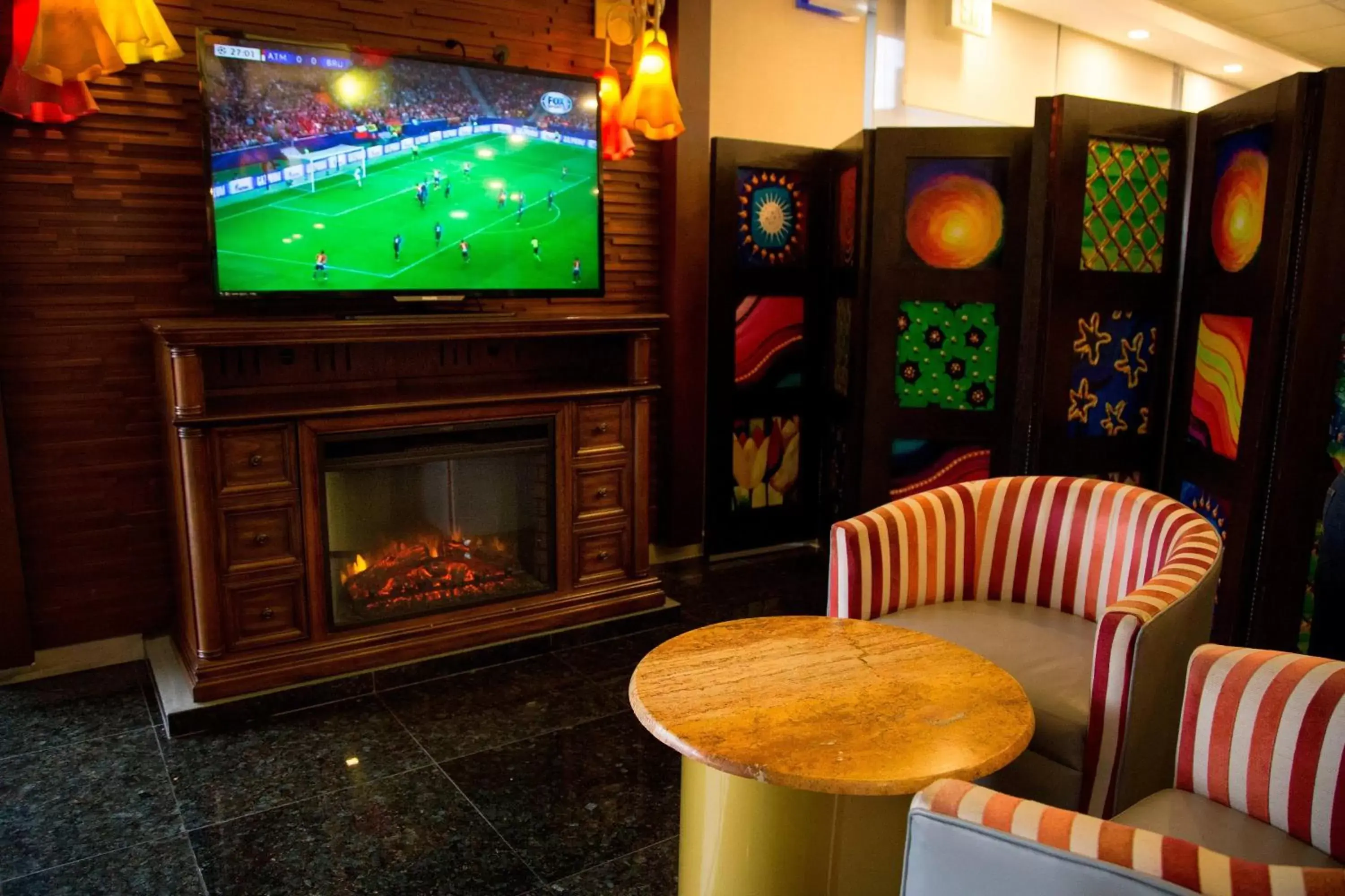 Lounge or bar, TV/Entertainment Center in Four Points by Sheraton Queretaro Norte