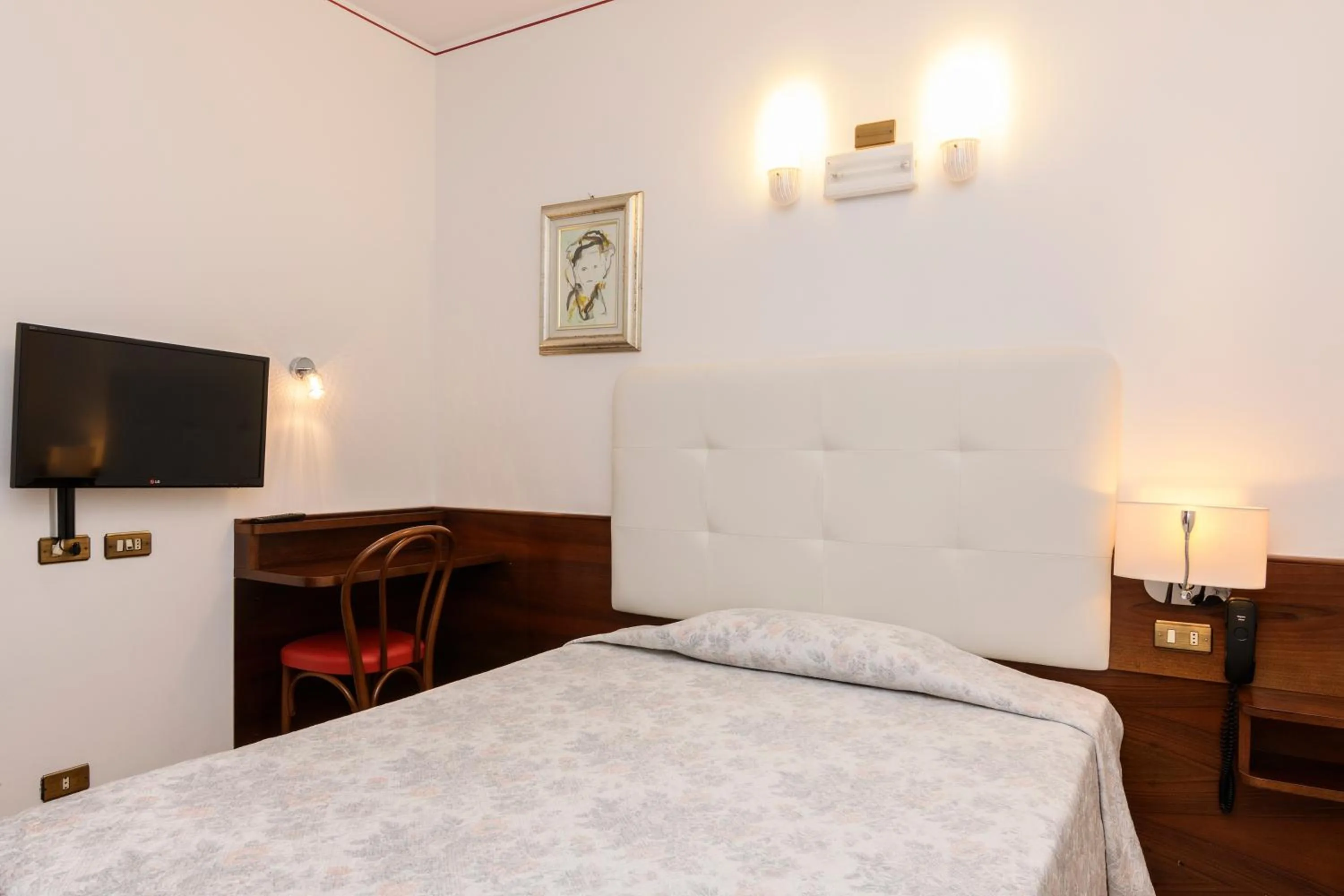 Bed in Hotel San Marco