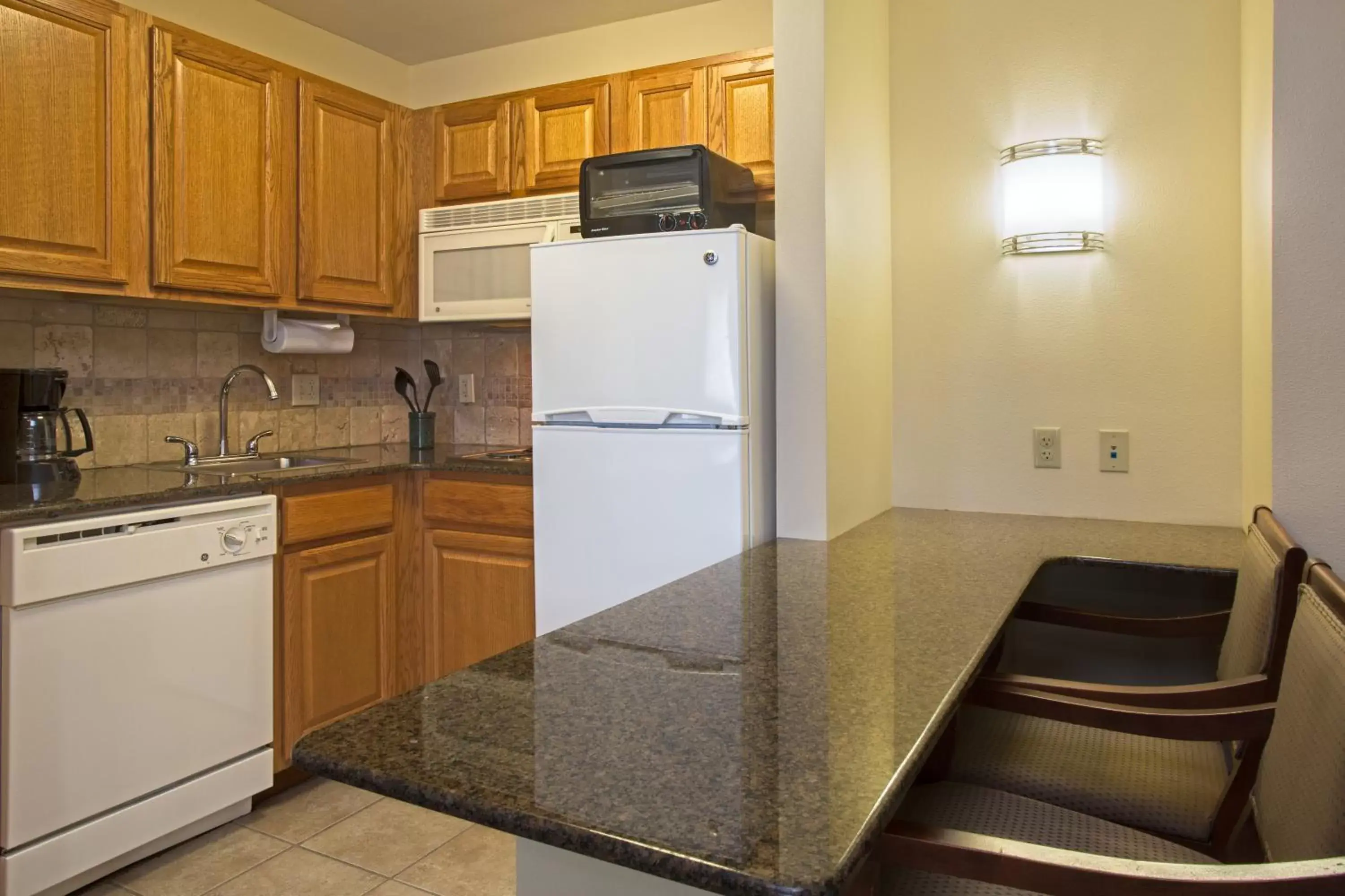 Photo of the whole room, Kitchen/Kitchenette in Staybridge Suites Tallahassee I-10 East, an IHG Hotel