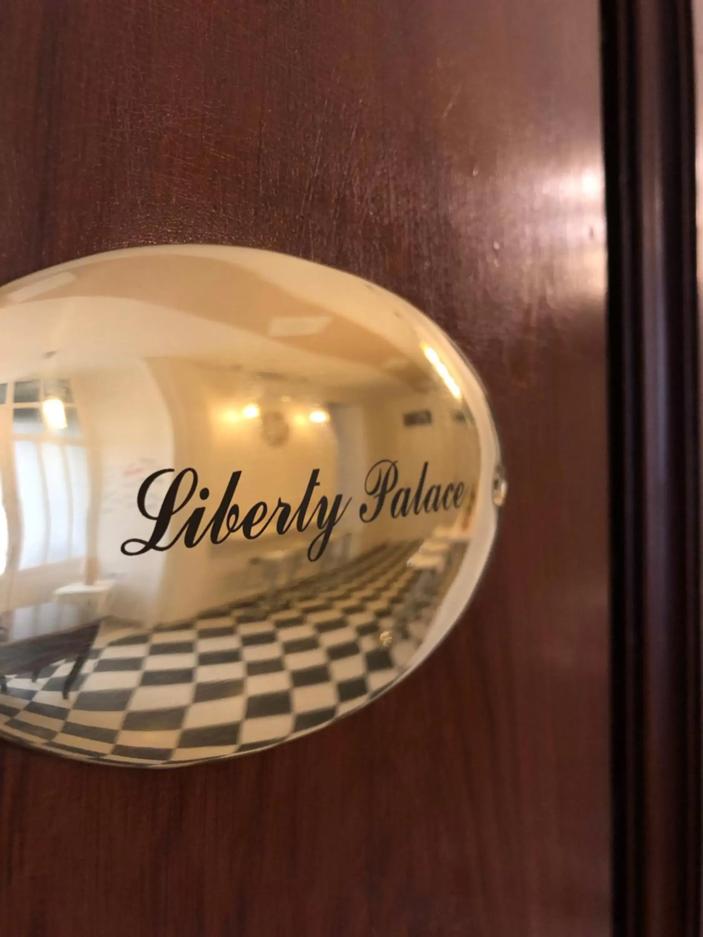 Property logo or sign in Liberty Palace