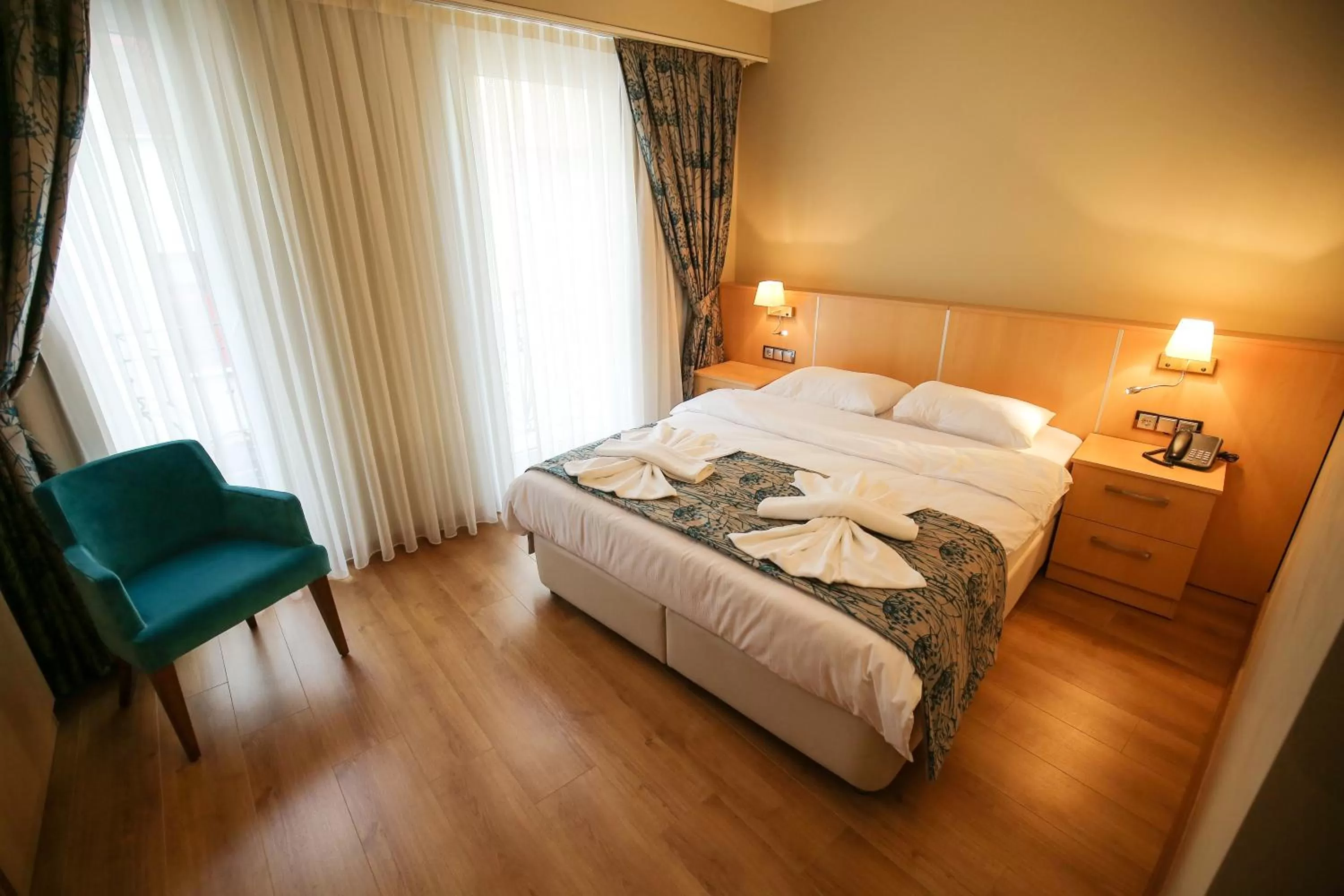 Bed in Artika Hotel