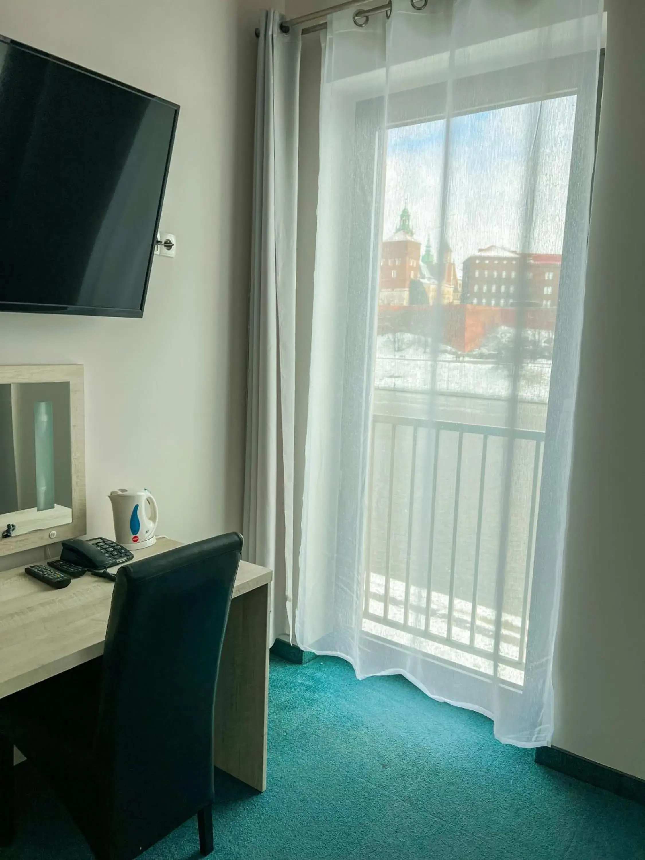 TV and multimedia, TV/Entertainment Center in Hotel Poleski