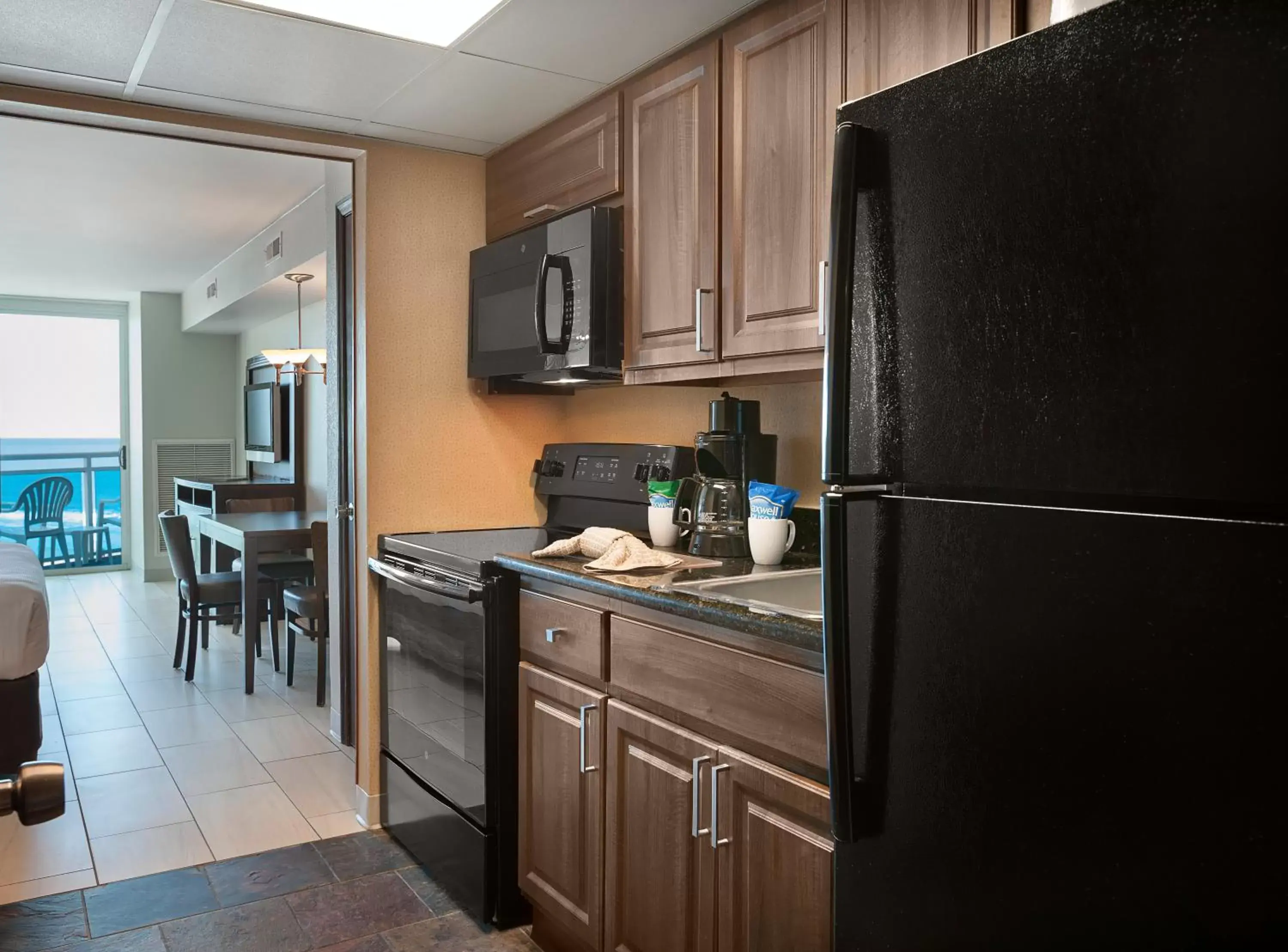 Kitchen or kitchenette, Kitchen/Kitchenette in Captain's Quarters Resort