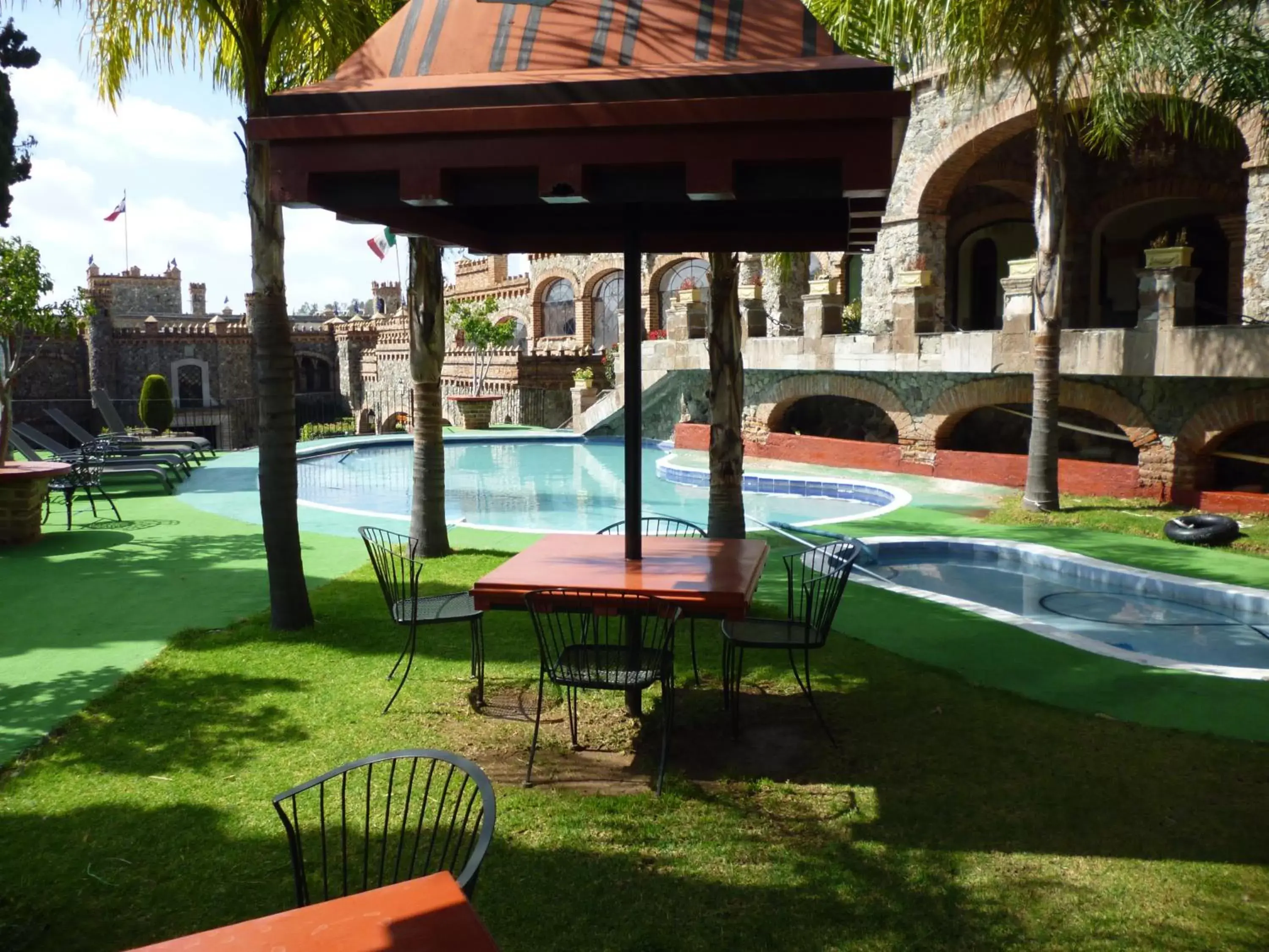 Children play ground, Swimming Pool in Hotel Castillo de Santa Cecilia