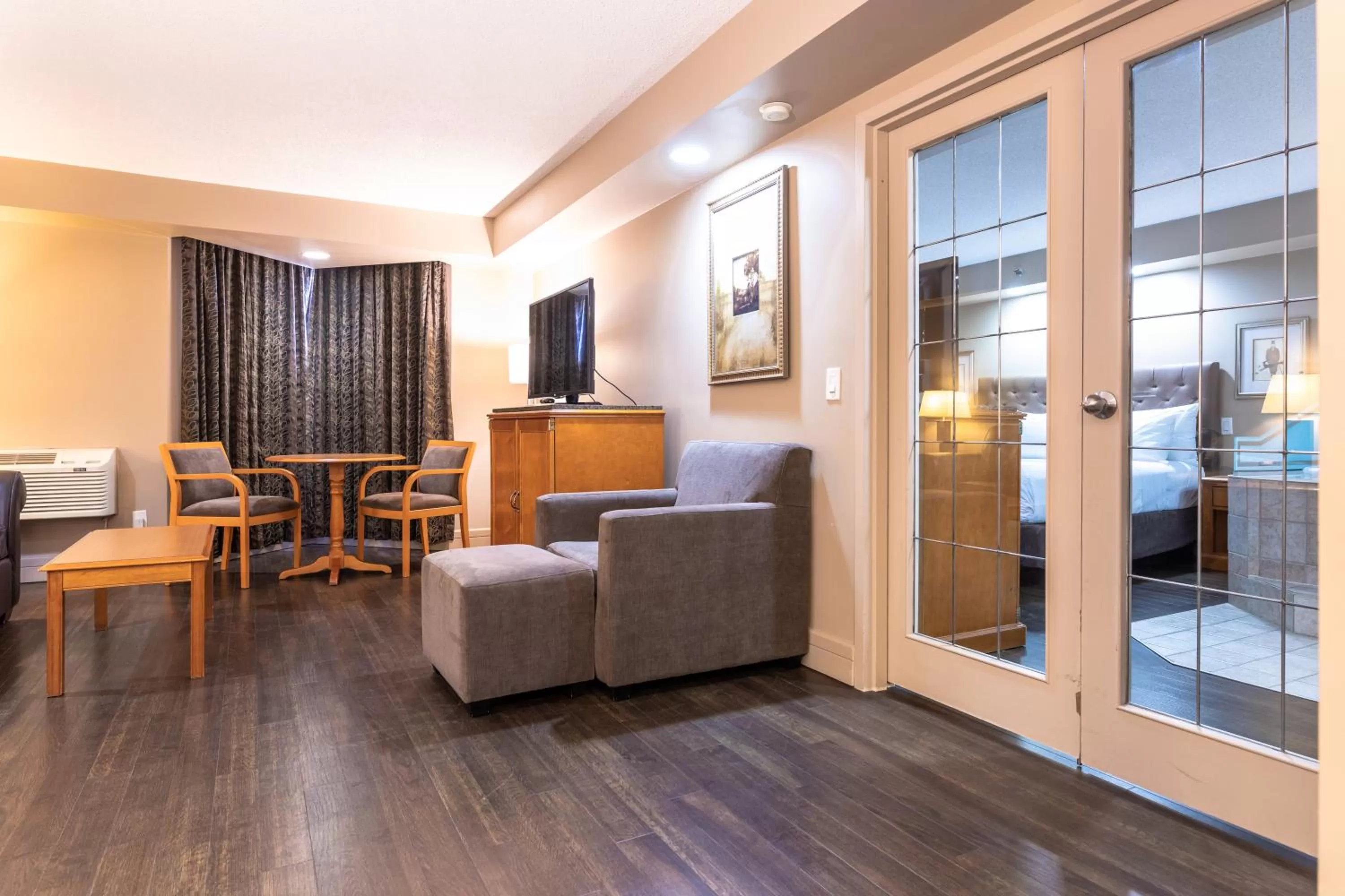 Living room in Royal Hotel West Edmonton, Trademark Collection by Wyndham