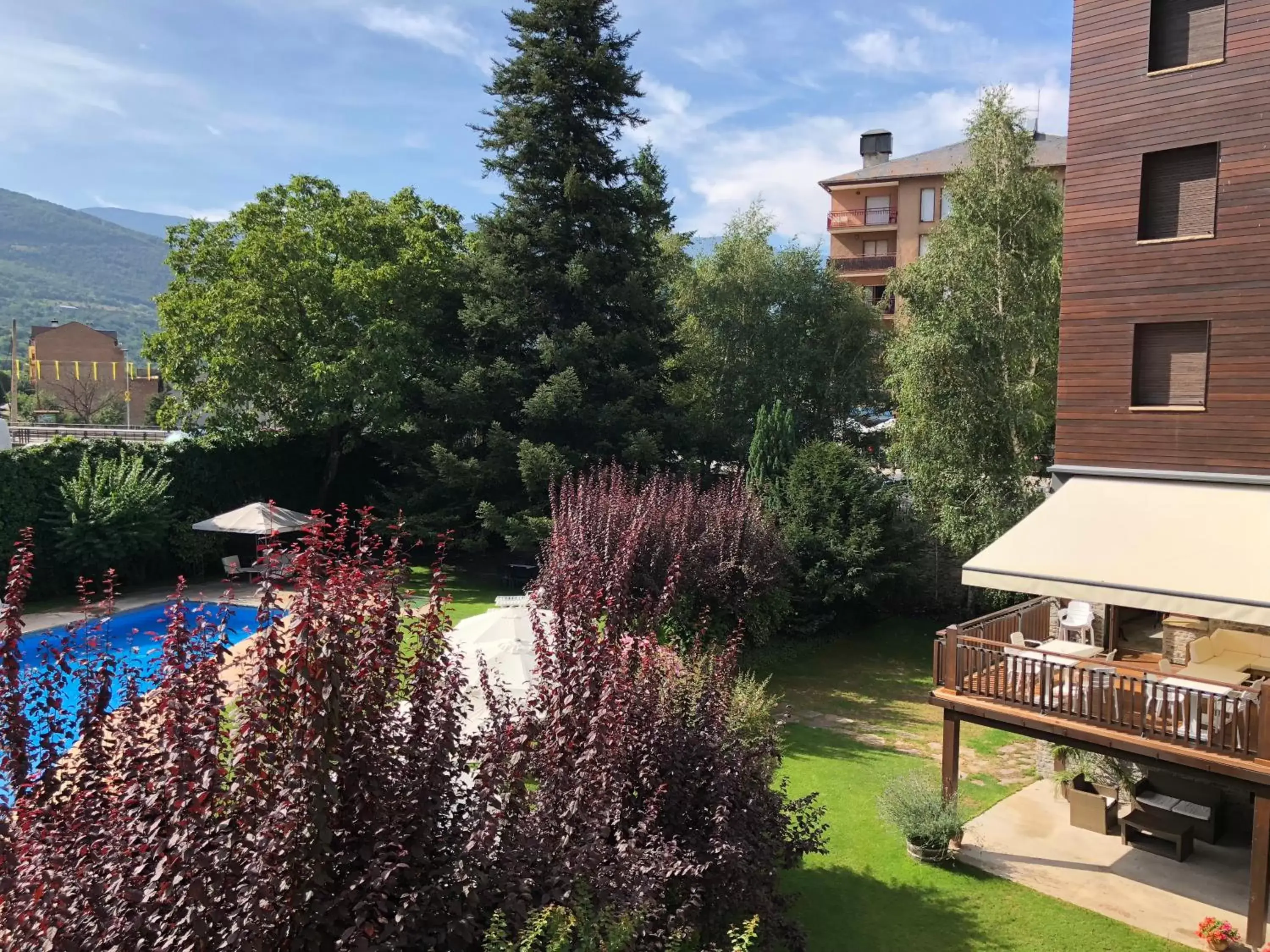 Garden, Pool View in Hotel Restaurant Pessets & SPA