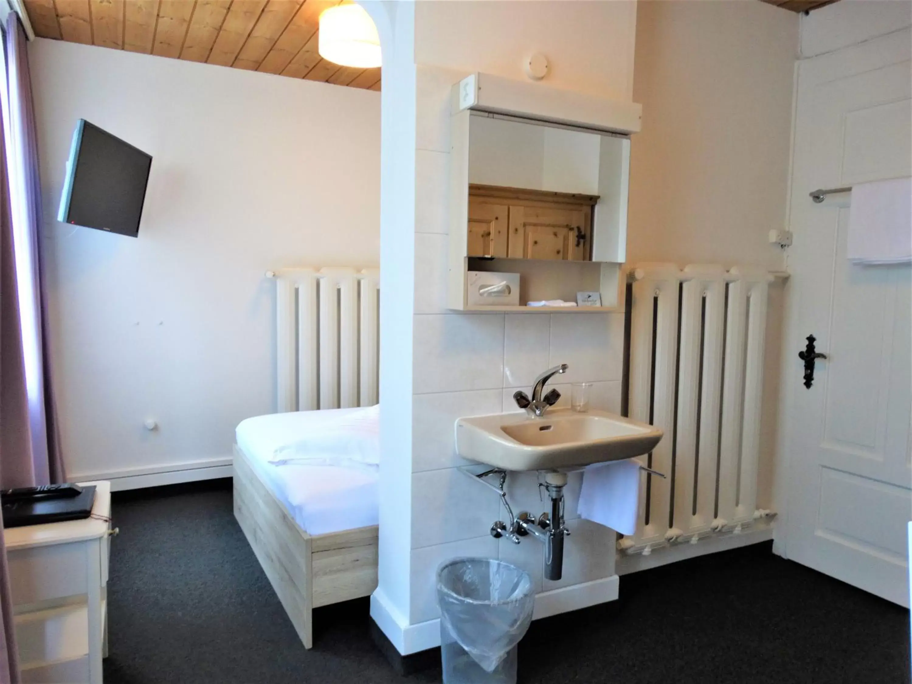 Photo of the whole room, Bathroom in Hotel Bündnerhof
