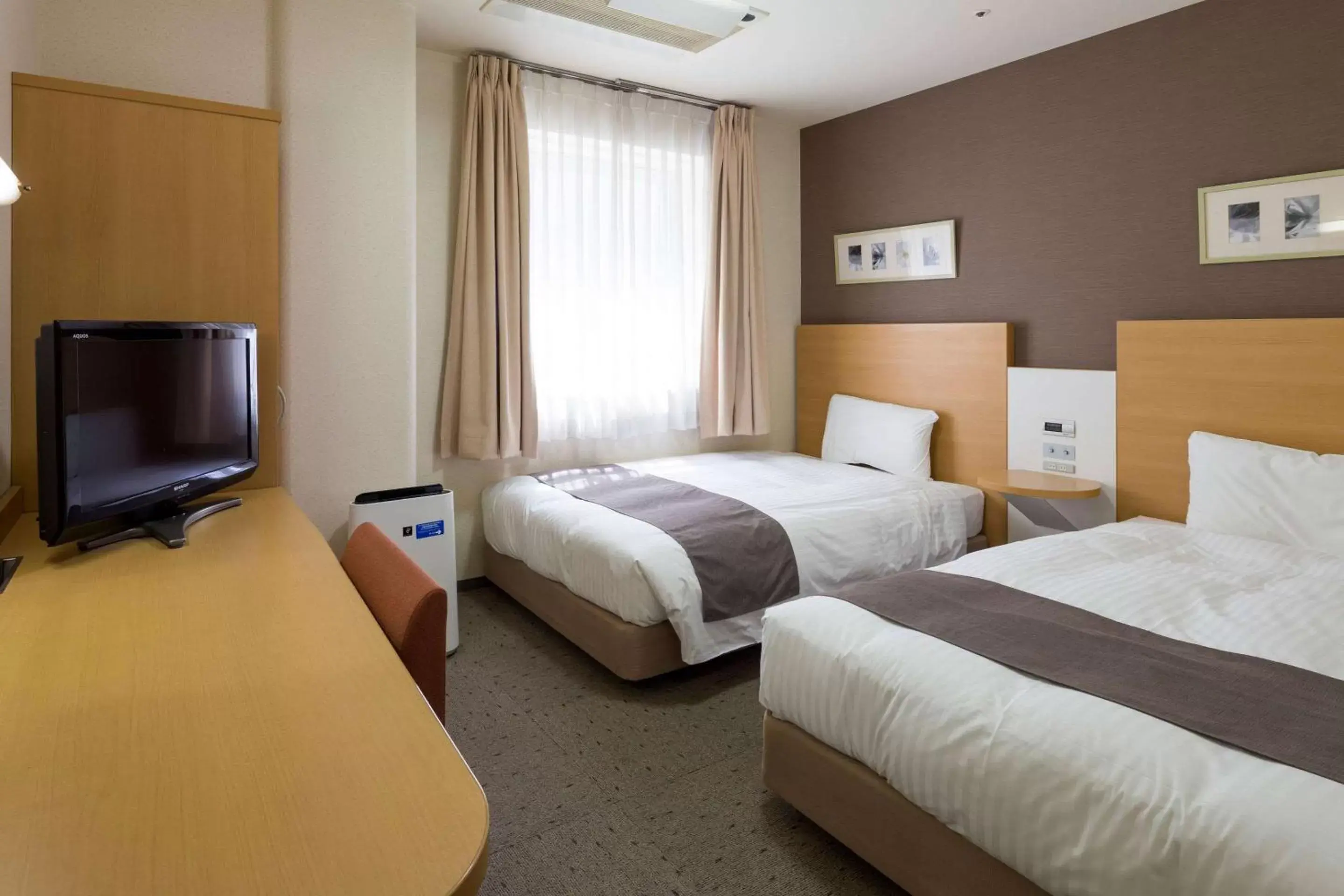 Photo of the whole room, Bed in Comfort Hotel Osaka Shinsaibashi