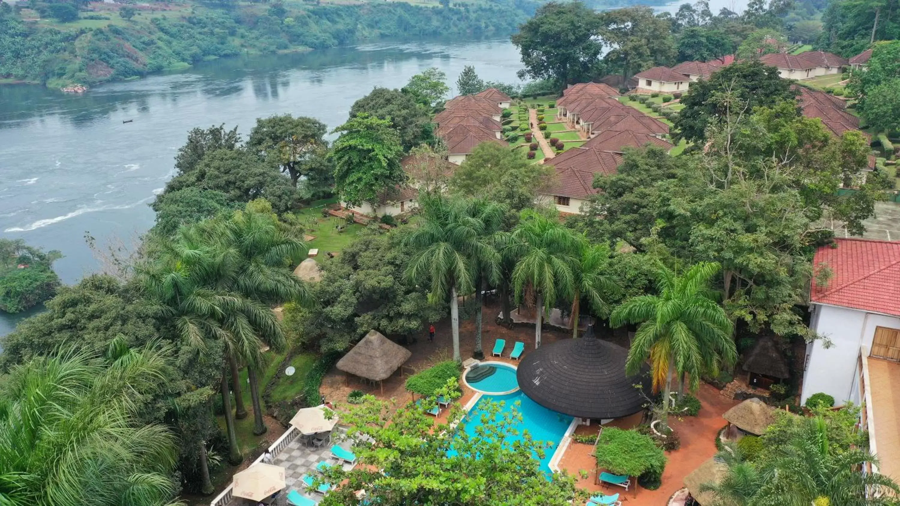 Swimming pool, Bird's-eye View in Jinja Nile Resort
