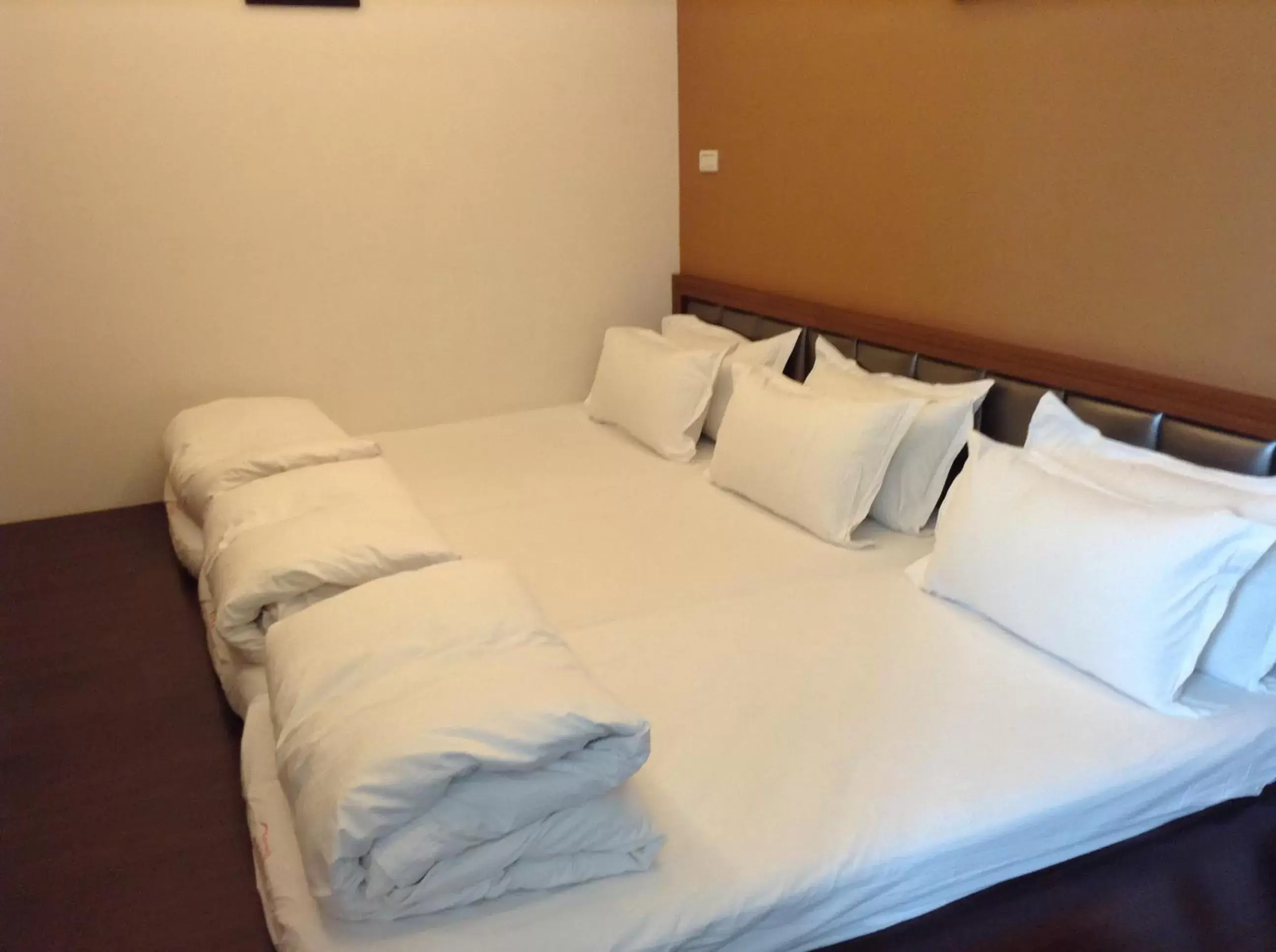 Bed in Watermark Hotel - Sizihwan