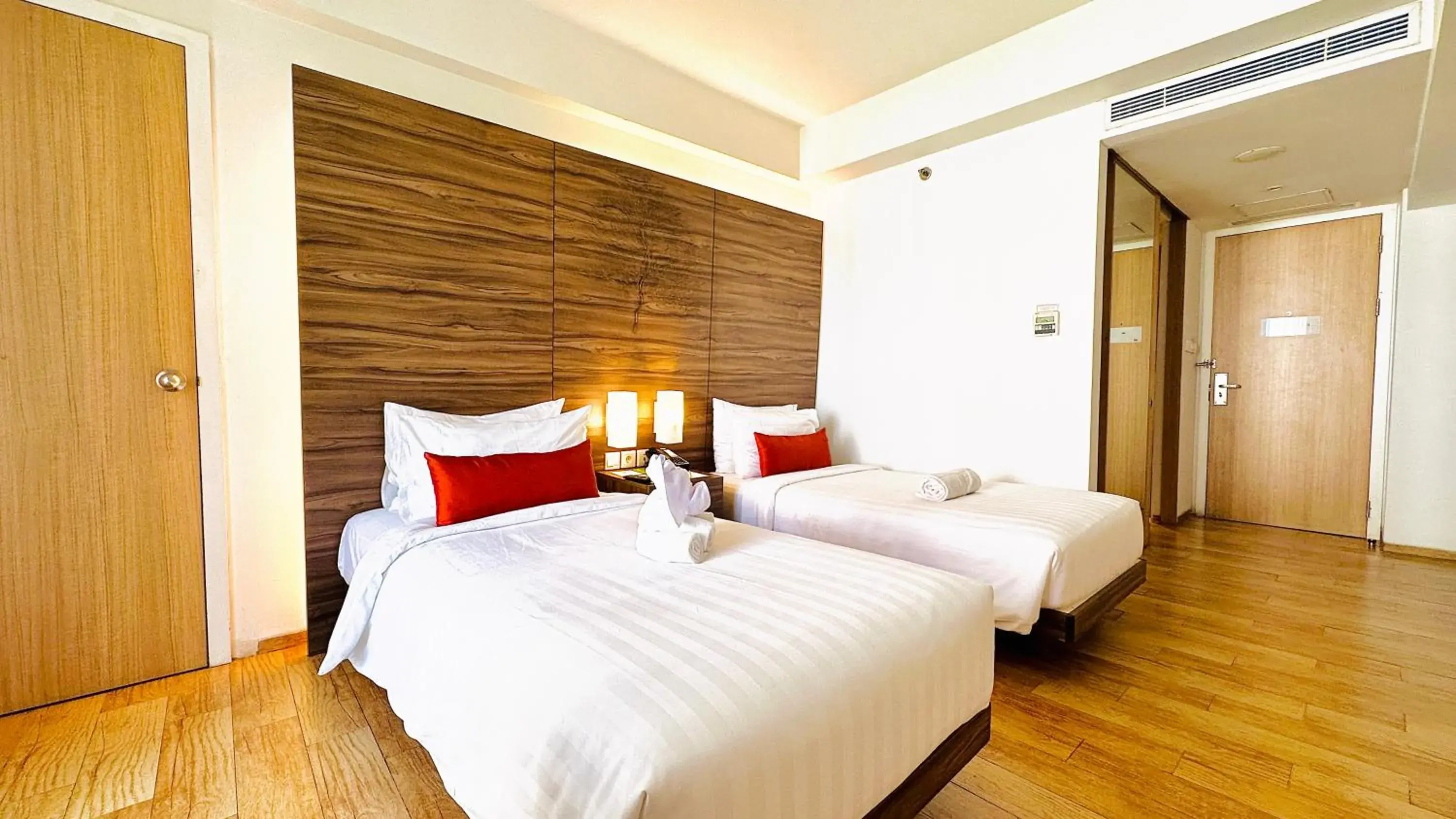 Bed in Grand Zuri Kuta Bali Hotel
